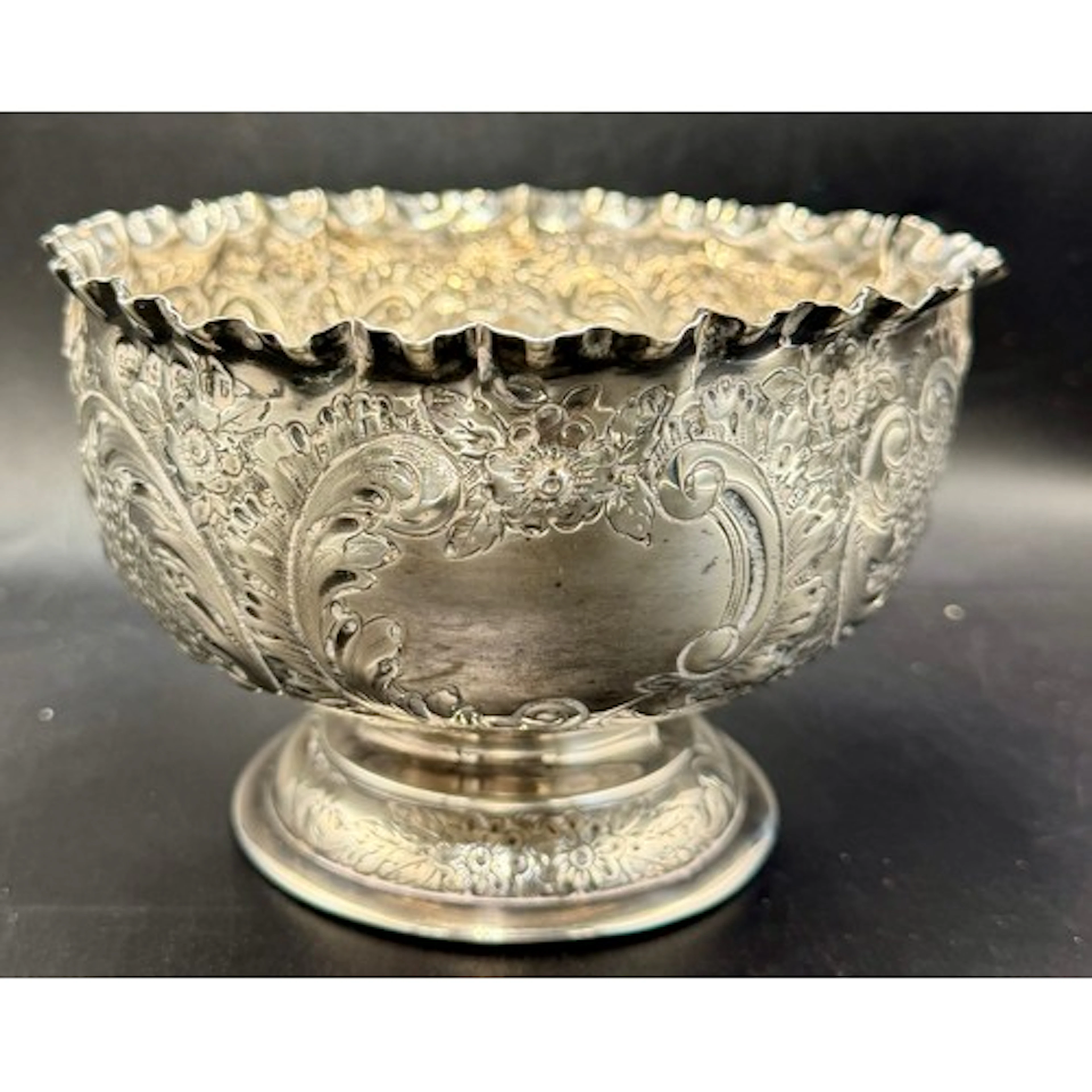 Hallmarked silver bowl with repoussé decoration. Birmingham...