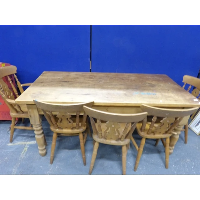 Large farm house style pine table and five chairs. 177cm lon...