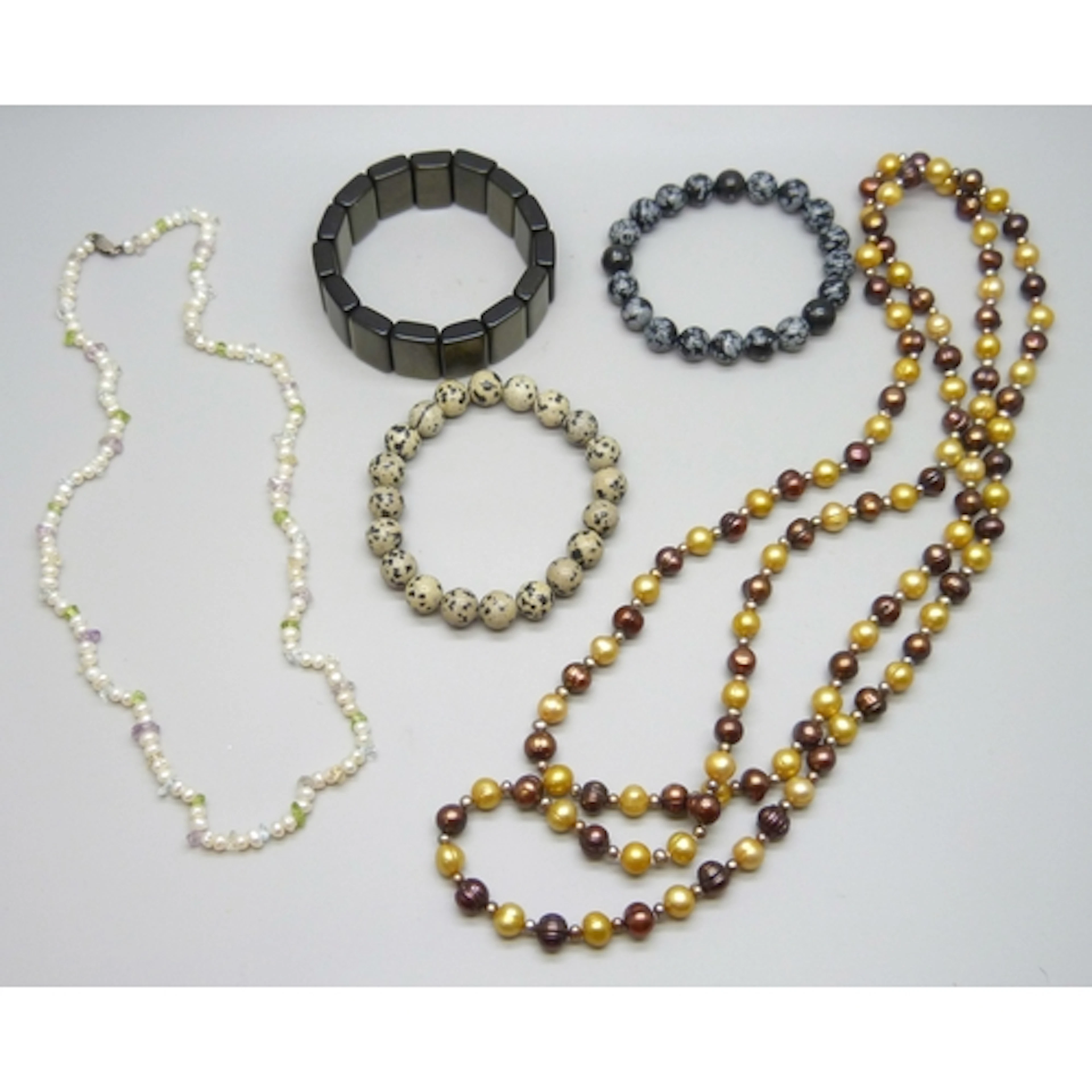 A collection of jewellery including two pearl necklaces, one...