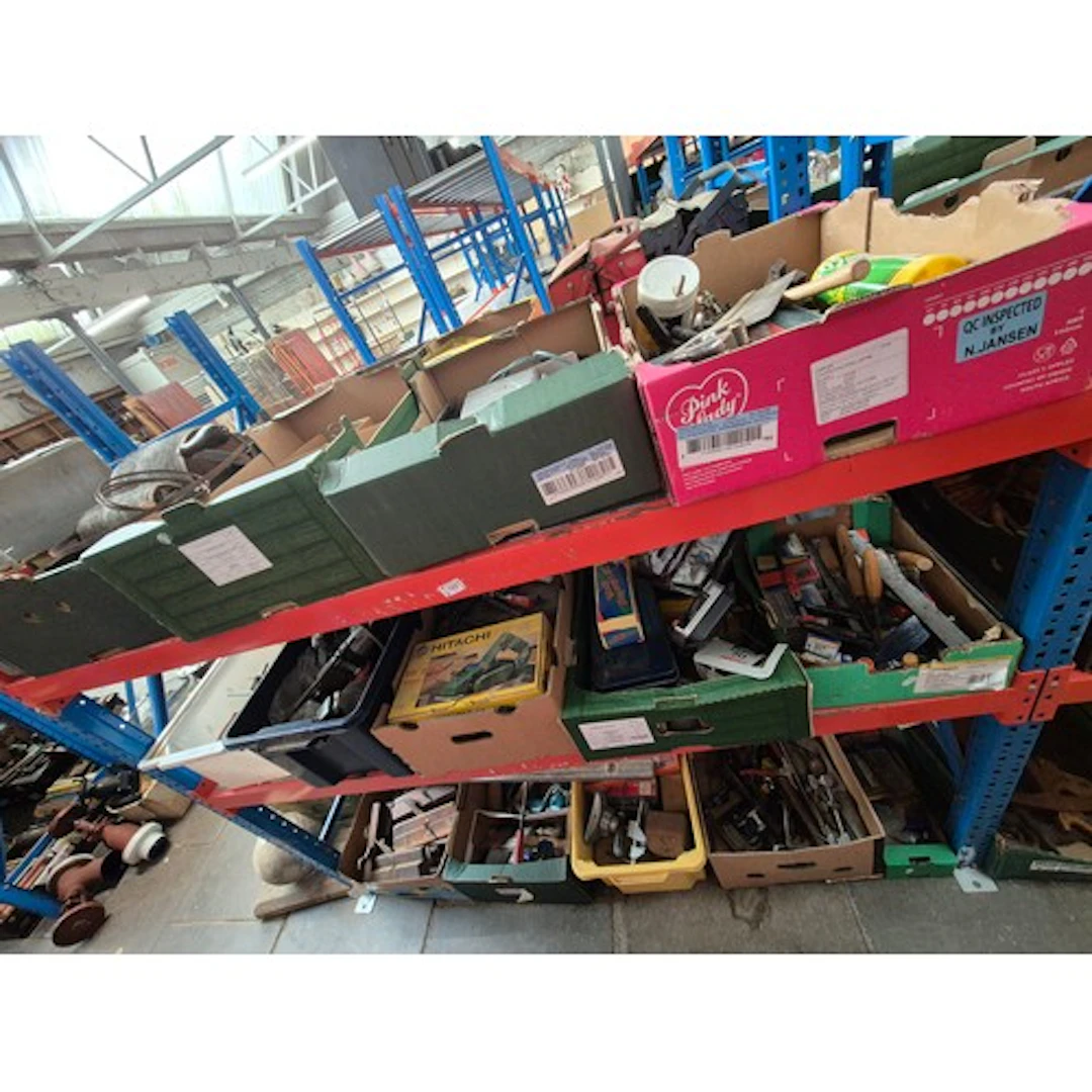 Three shelves of tools in 14 boxes and a case including chis...