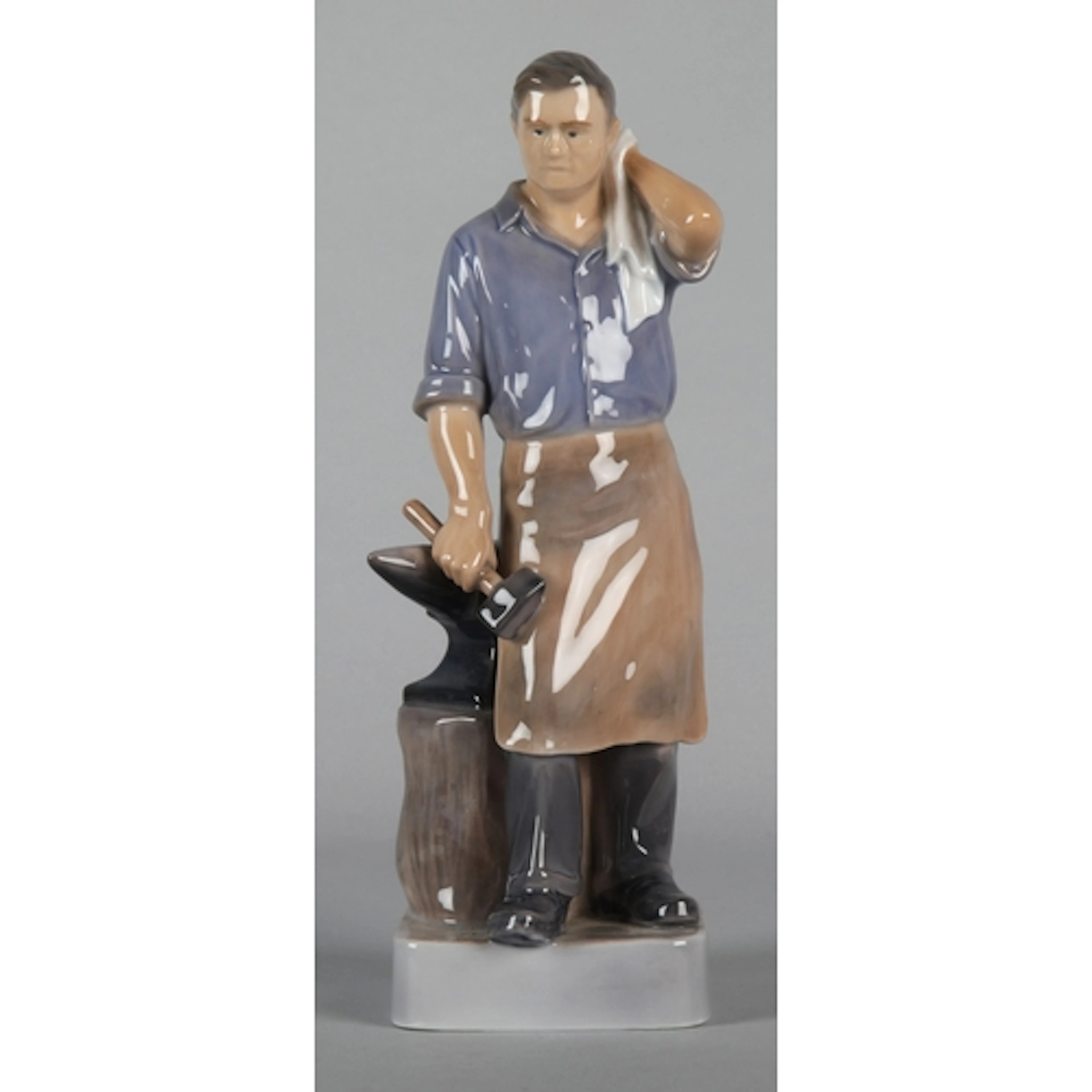 Royal Copenhagen 'Blacksmith' model no.4502, 23cm h.