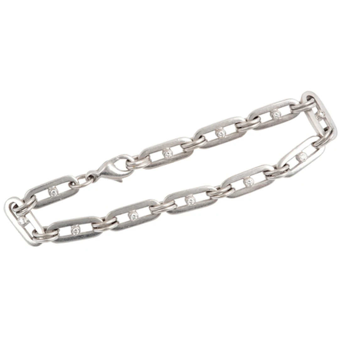 Cropp and Farr, an 18ct white gold and diamond bracelet, com...