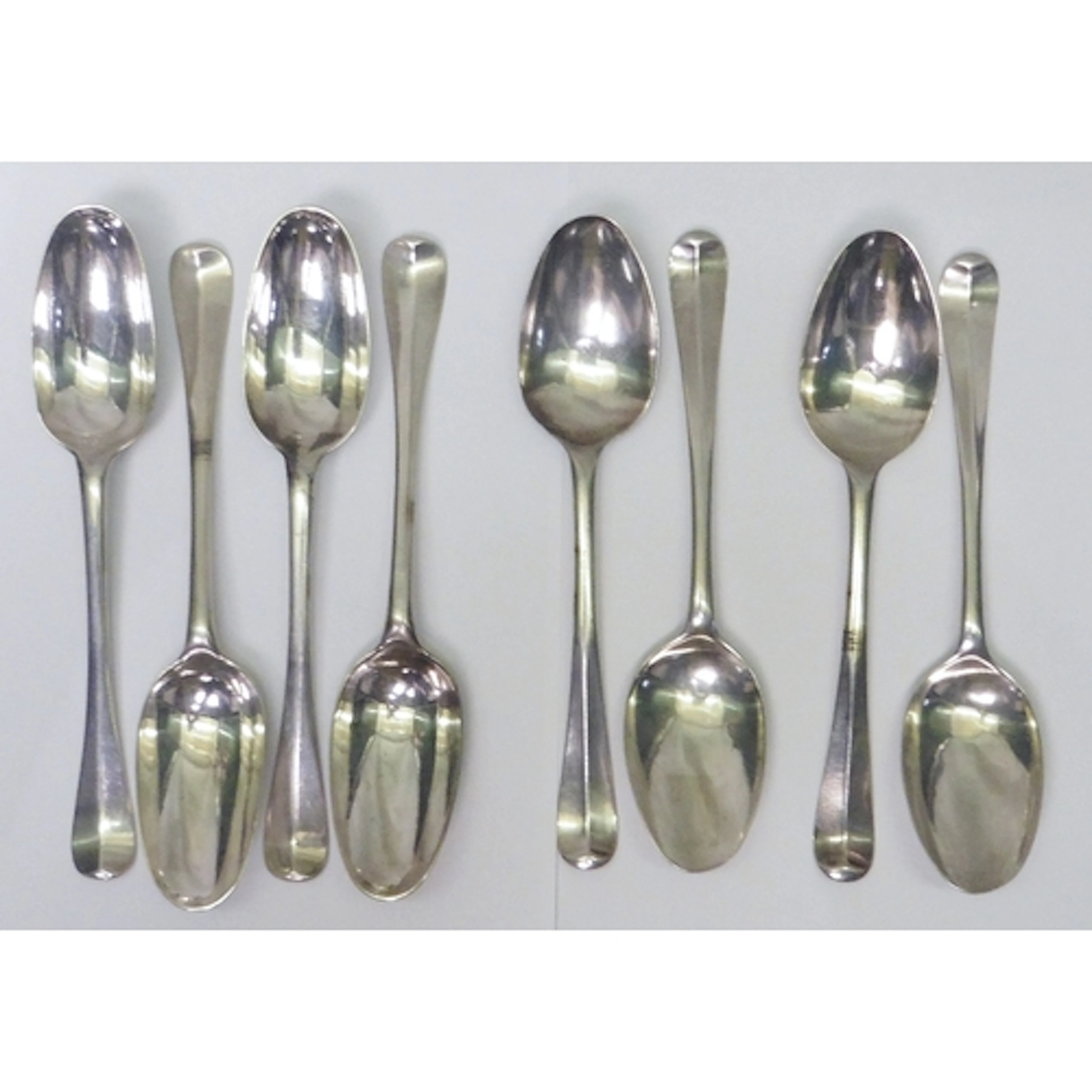 A set of four George I rat tail table spoons bearing matchin...