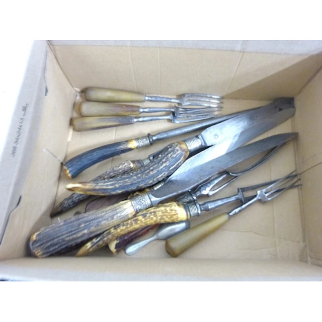 Small box of horn handled cutlery.