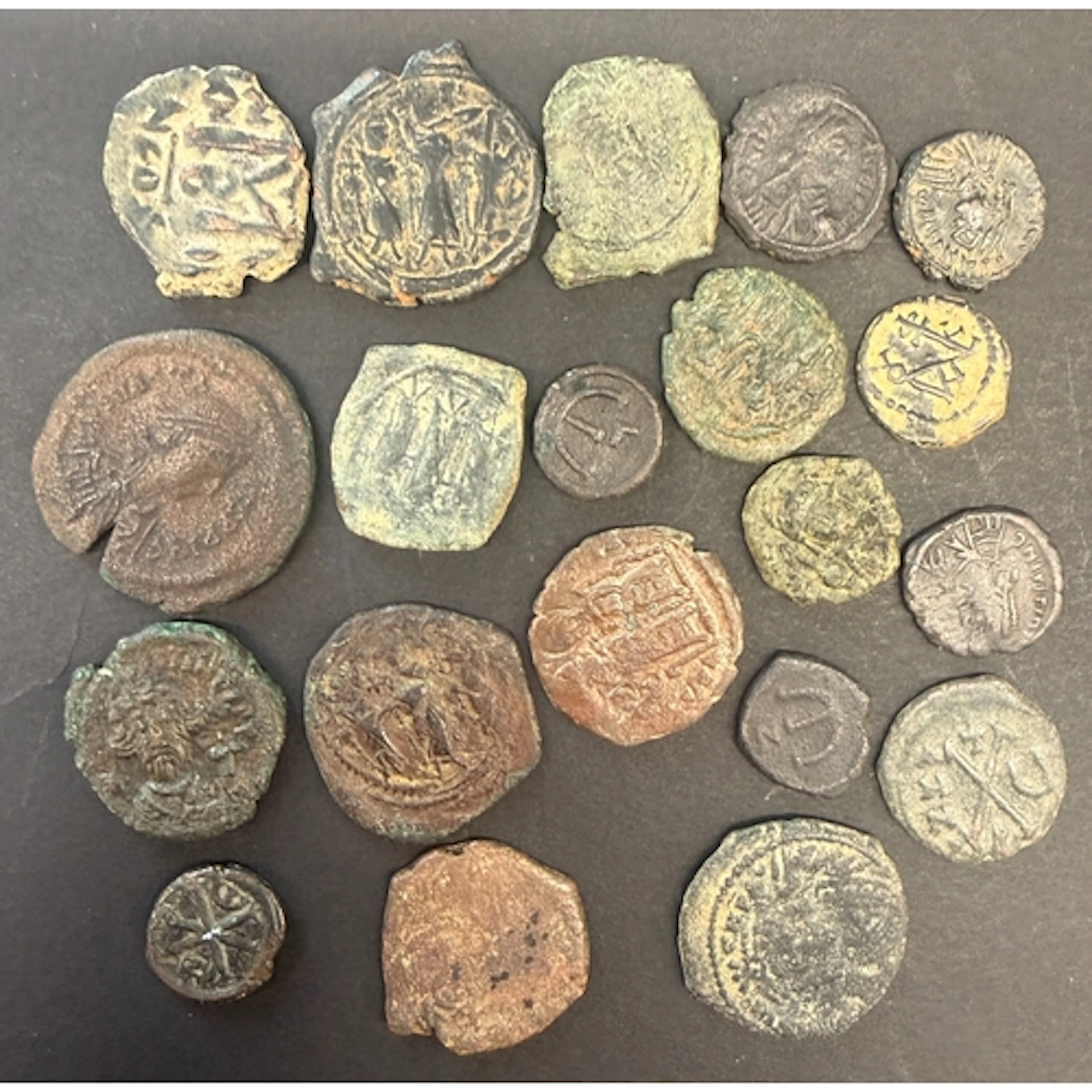 A group of twenty early Byzantine bronze coins, including is...
