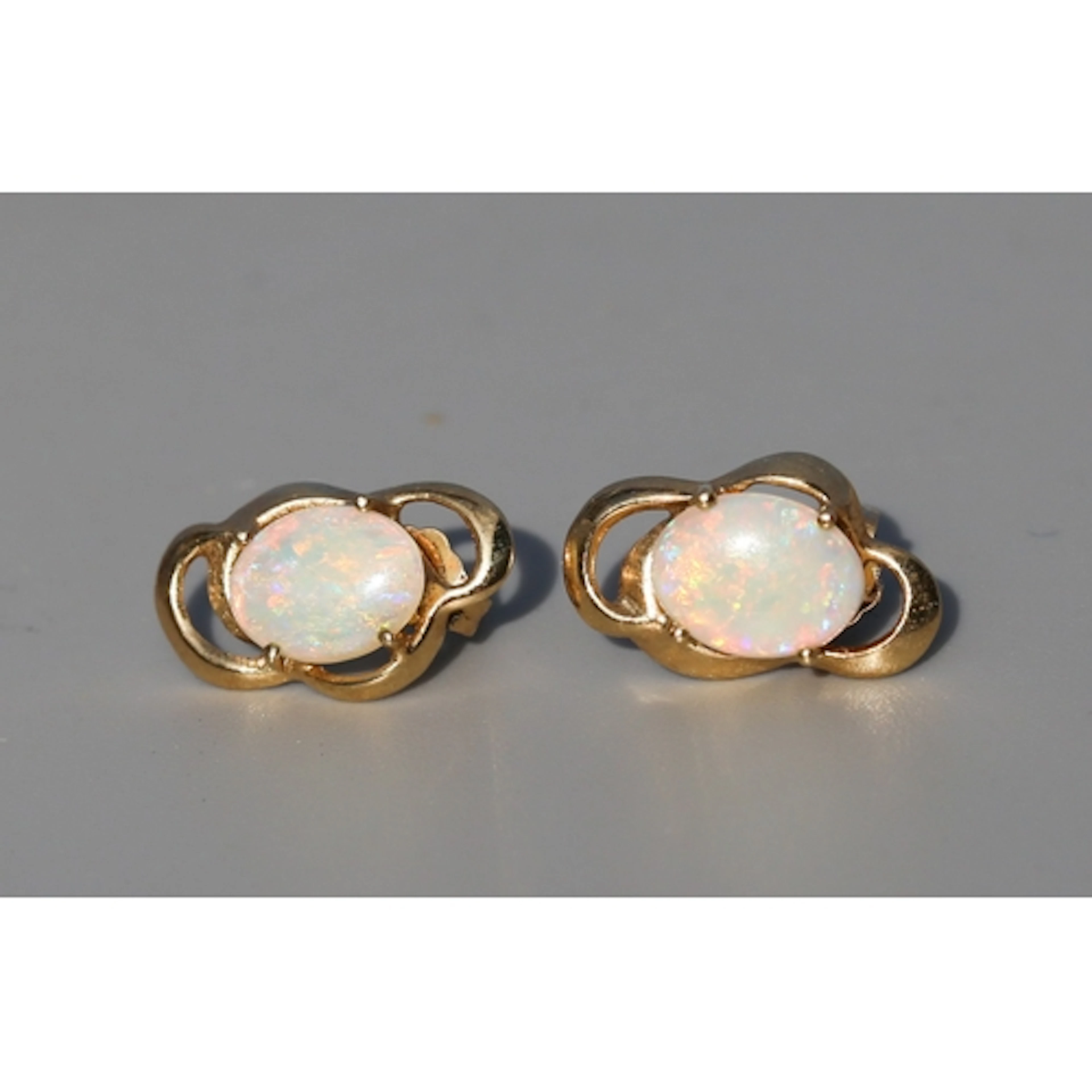 Pair of Attractively Detailed, Opal Set Ribbon Motif Earring...
