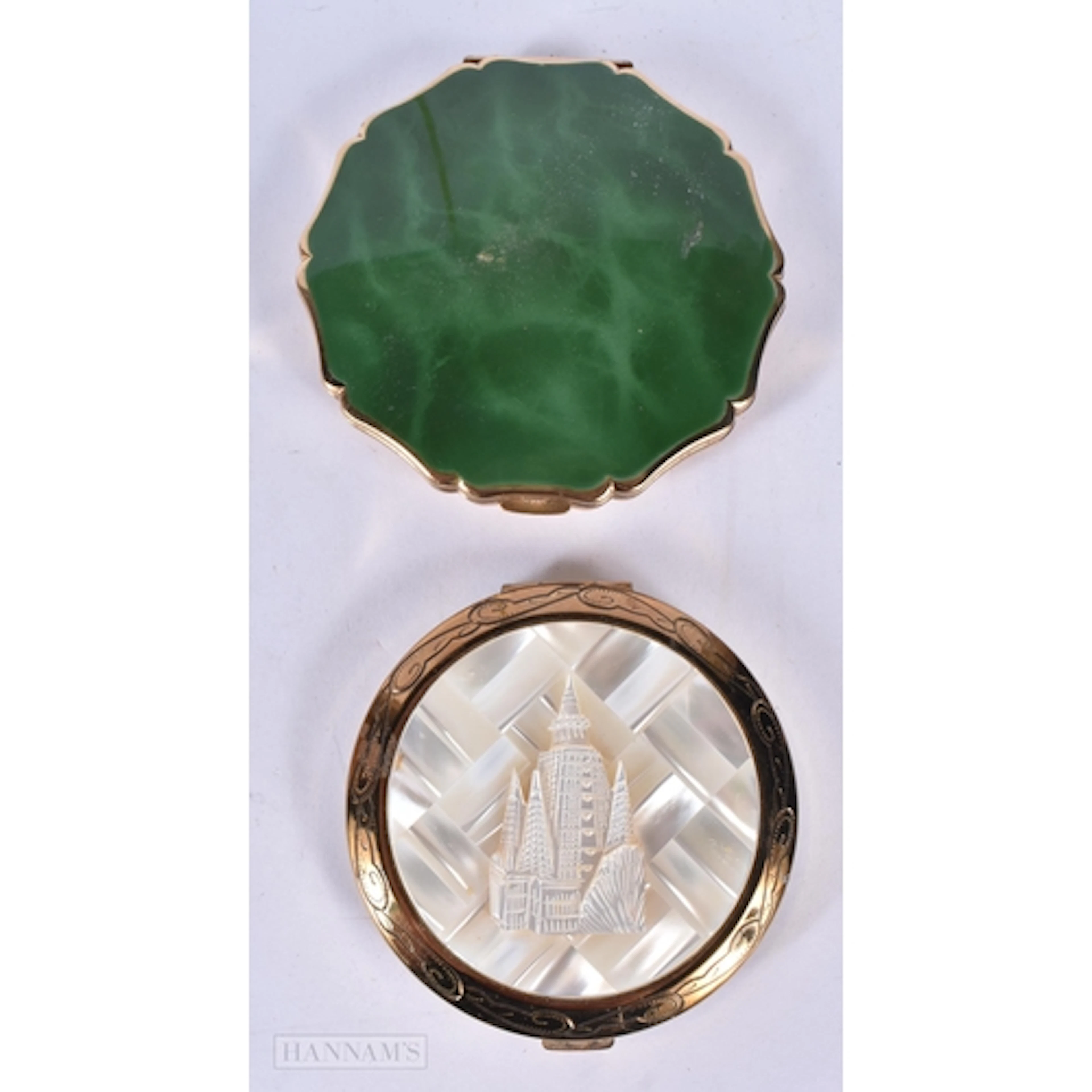 A ladies powder compact decorated in mother of pearl depicti...