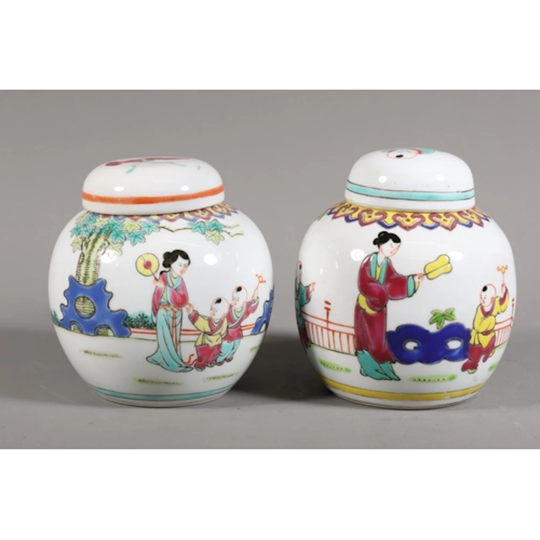 Pair of famille rose ginger jars and covers.