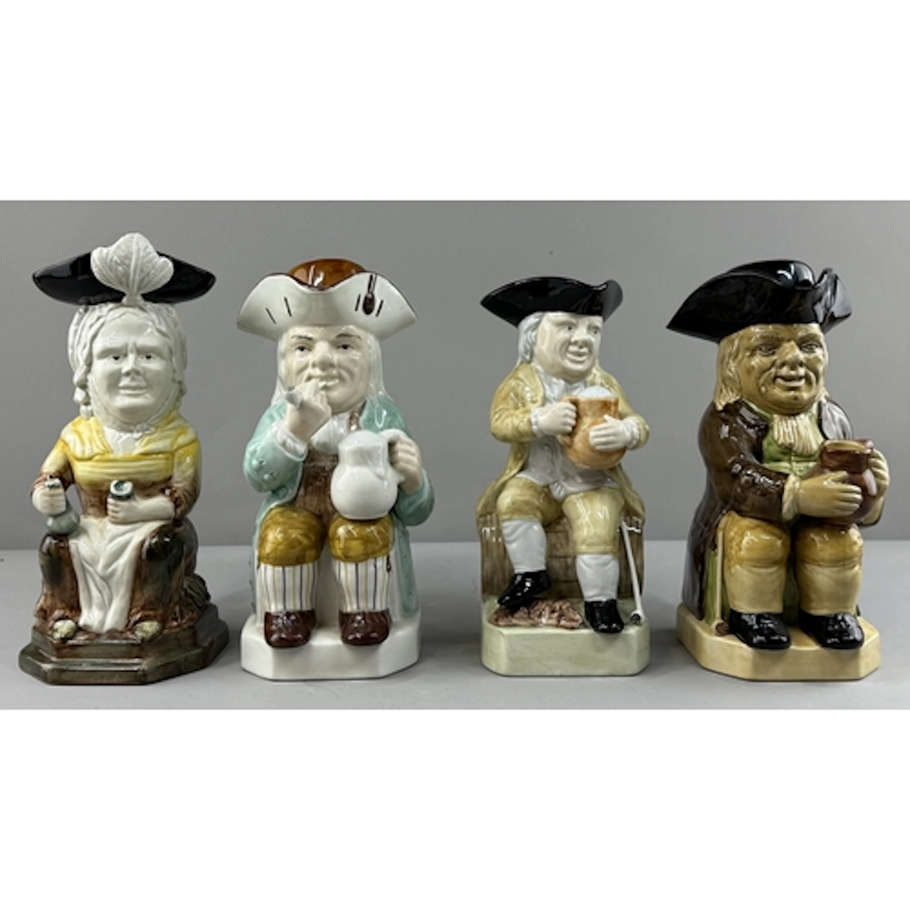 Four Doulton limited edition replica Toby jugs, one of Admir...