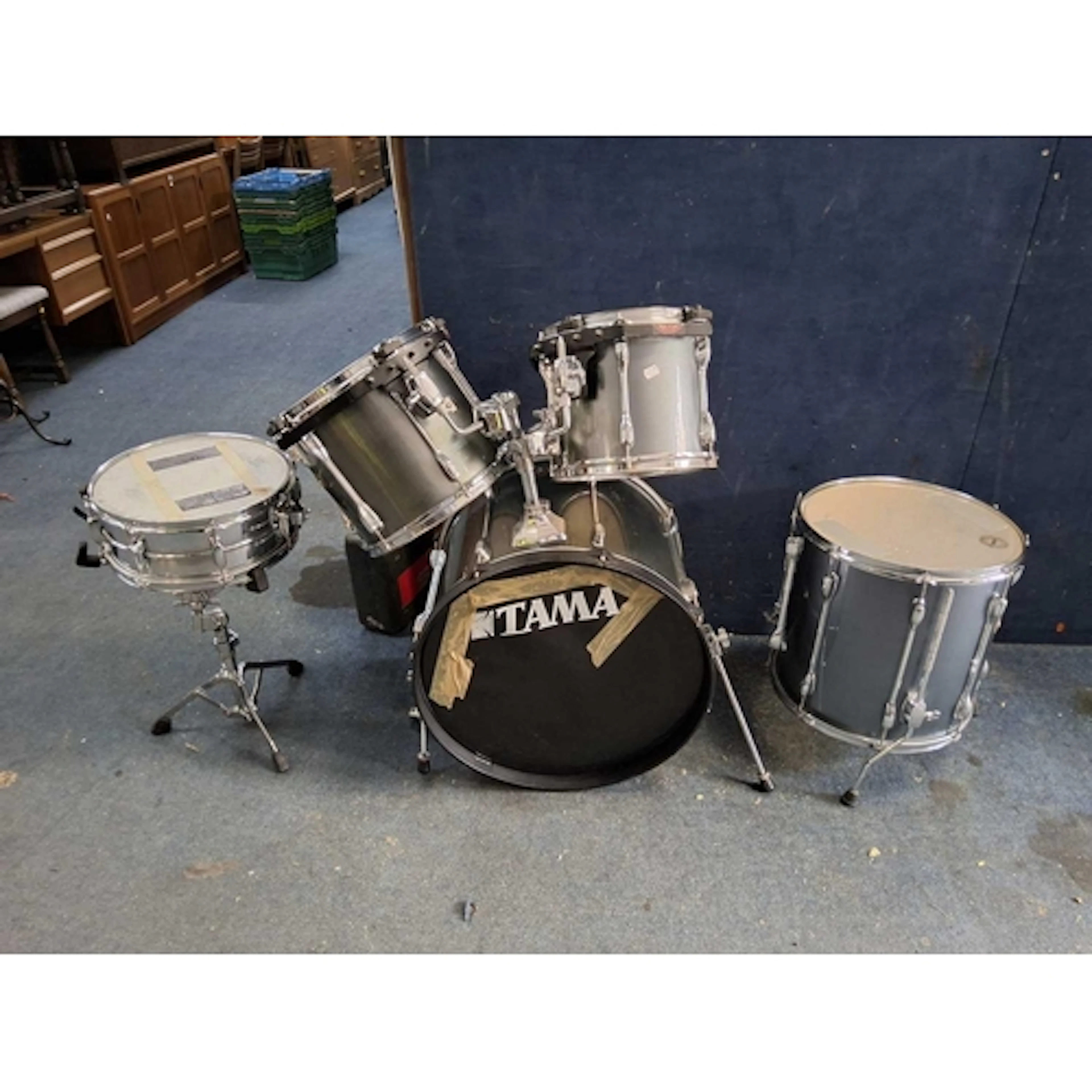 A TAMA ROCKSTAR FIVE PIECE DRUM KIT with a 22x16 kick drum w...