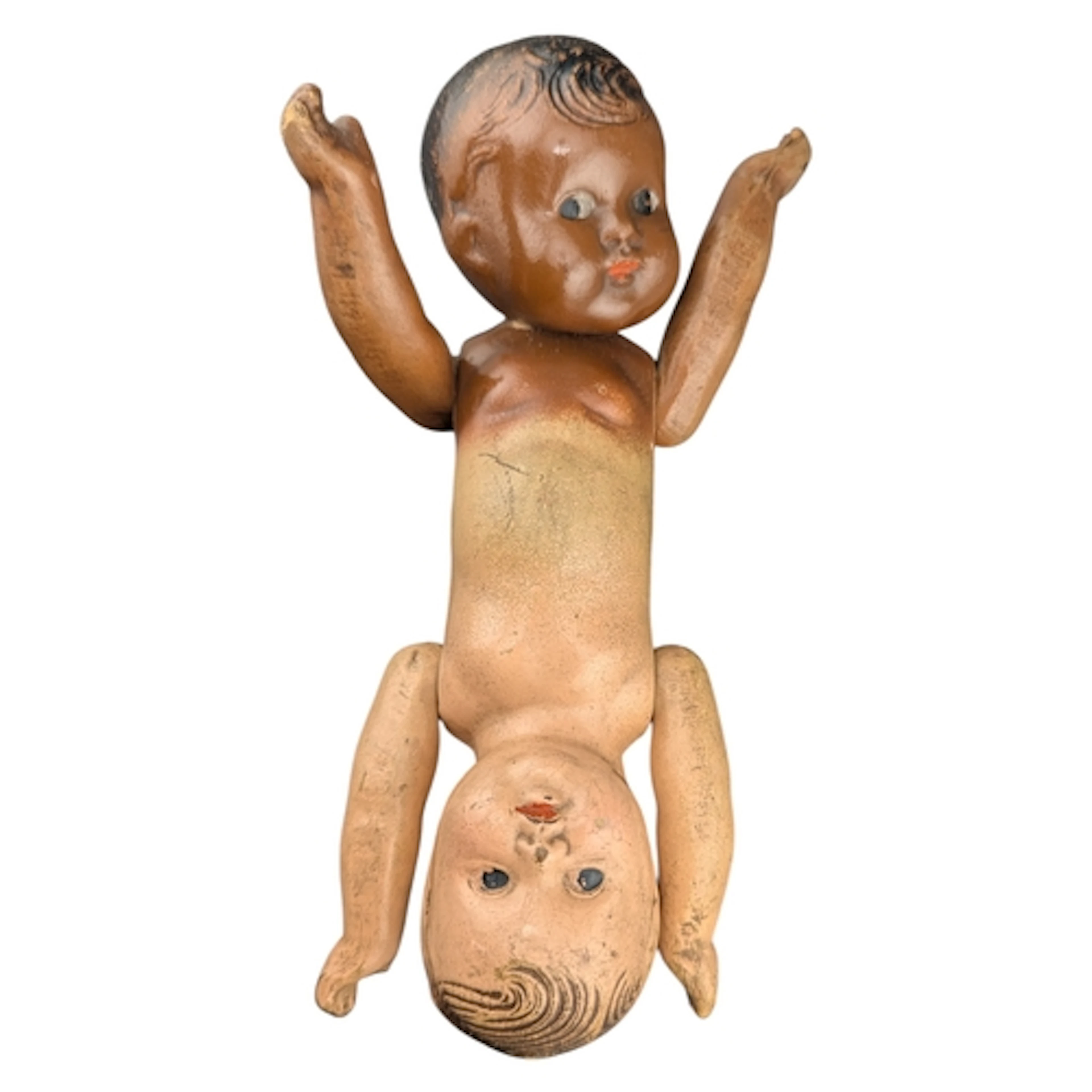 An early 20th century Topsy Turvy doll. Featuring two heads ...