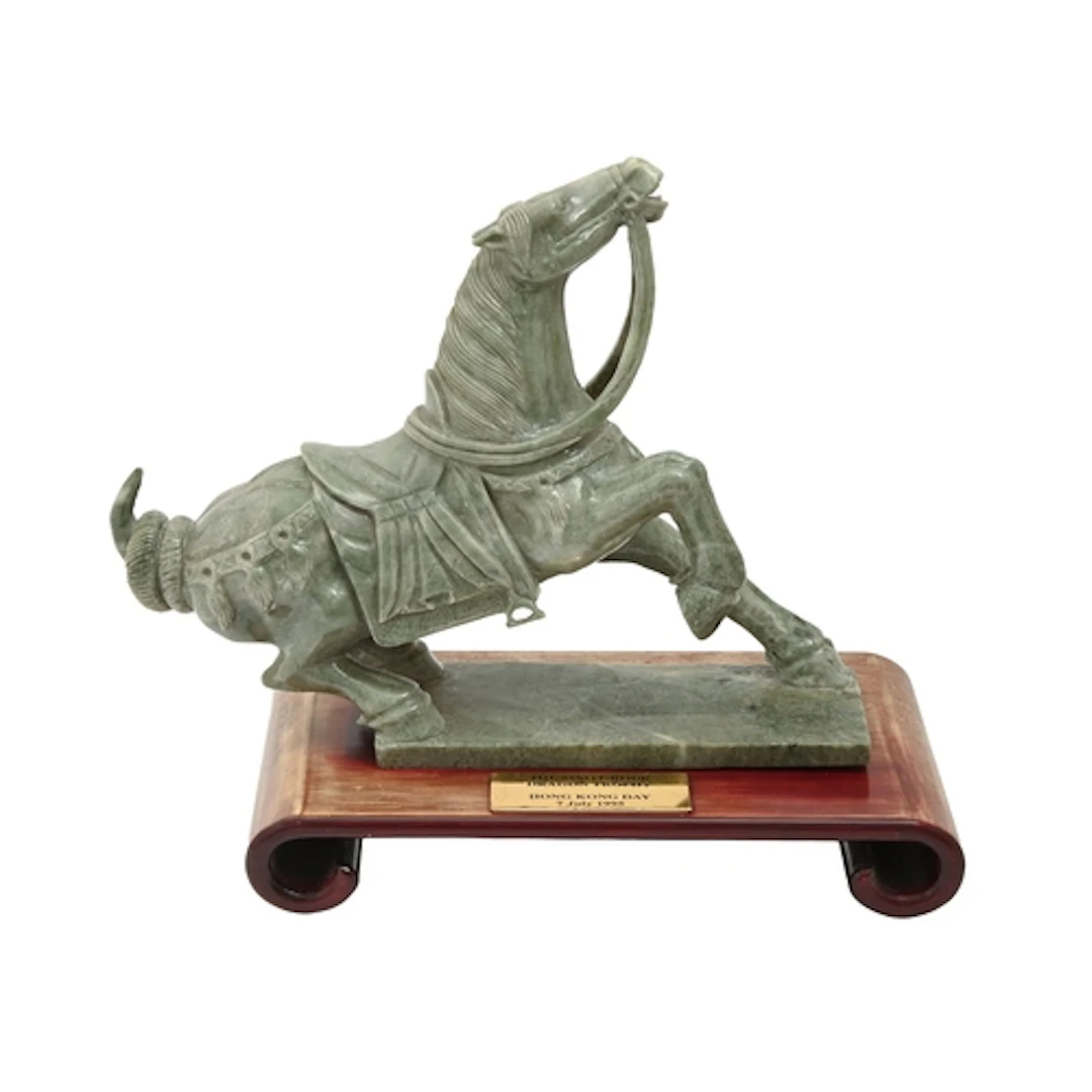 A Chinese jade sculpture of a horse, late 20th c, 28cm h, st...