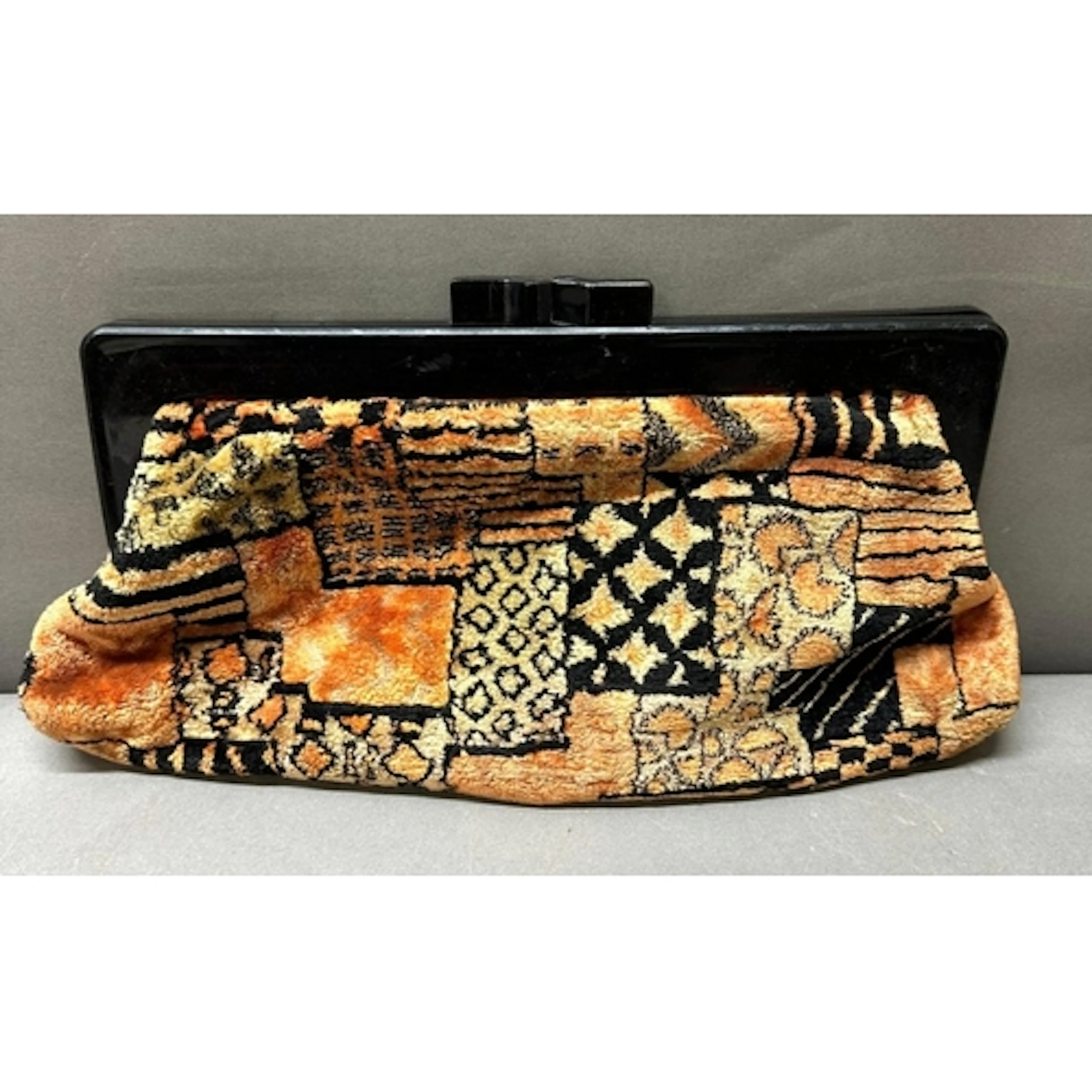 A Vintage 1960's carpet clutch handbag