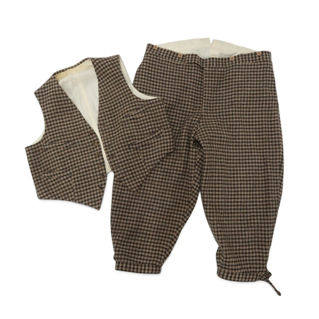 A vintage men's cape in houndstooth wool by Gala Forest; tog...