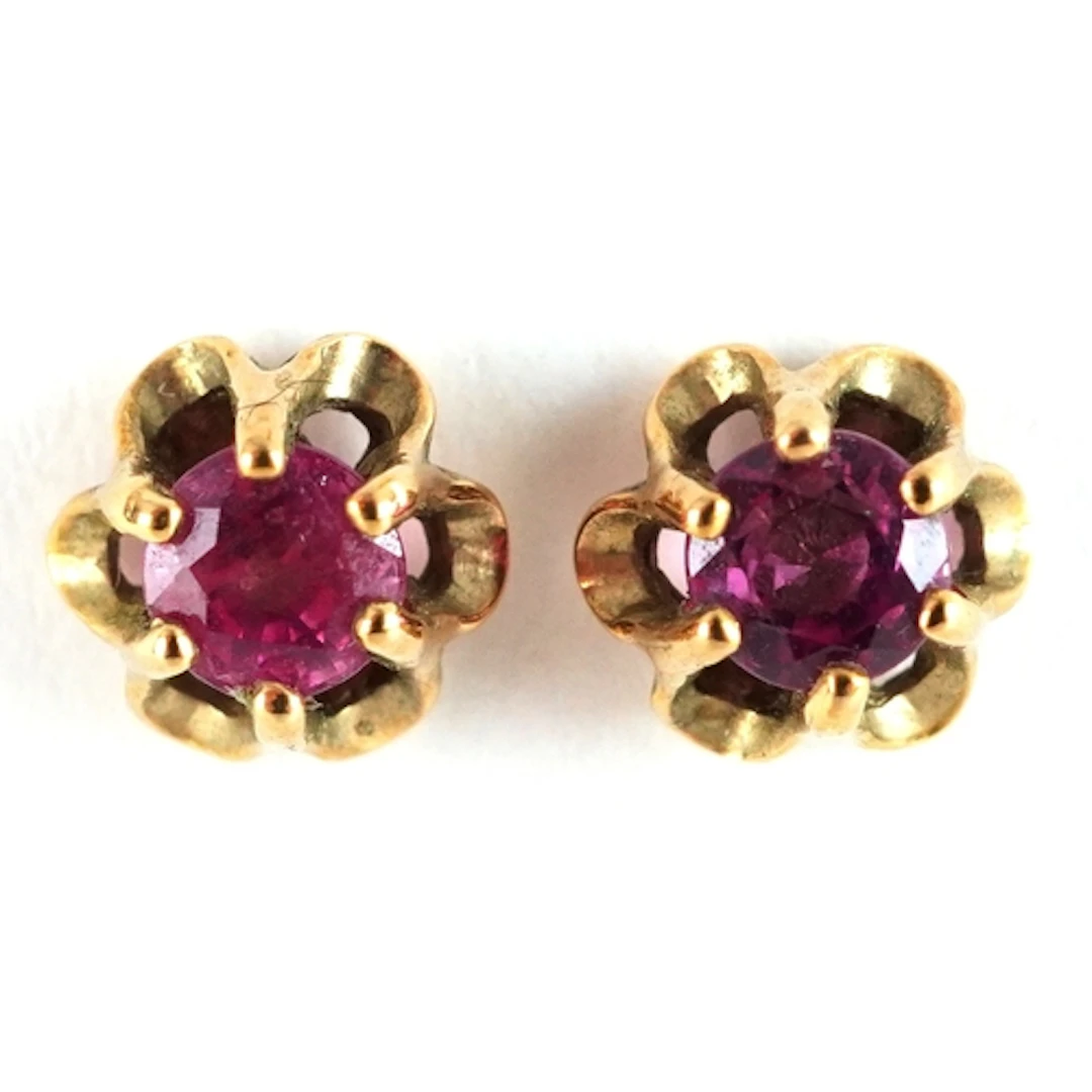 Pair of 9ct gold pink stone stud earrings, 5.8mm in diameter...