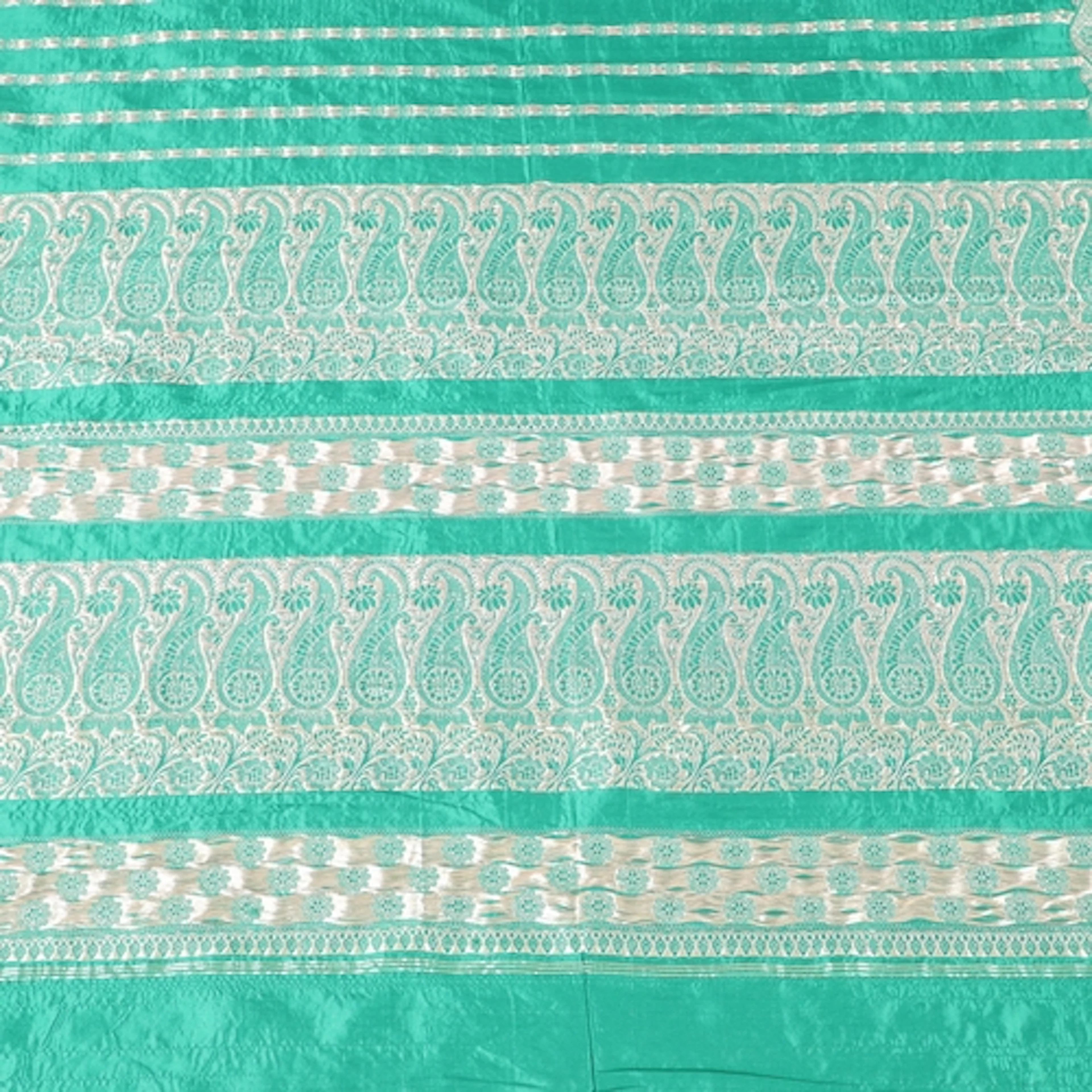 A LENGTH OF EMERALD GREEN SARI SILK. Late 19th - early 20th ...