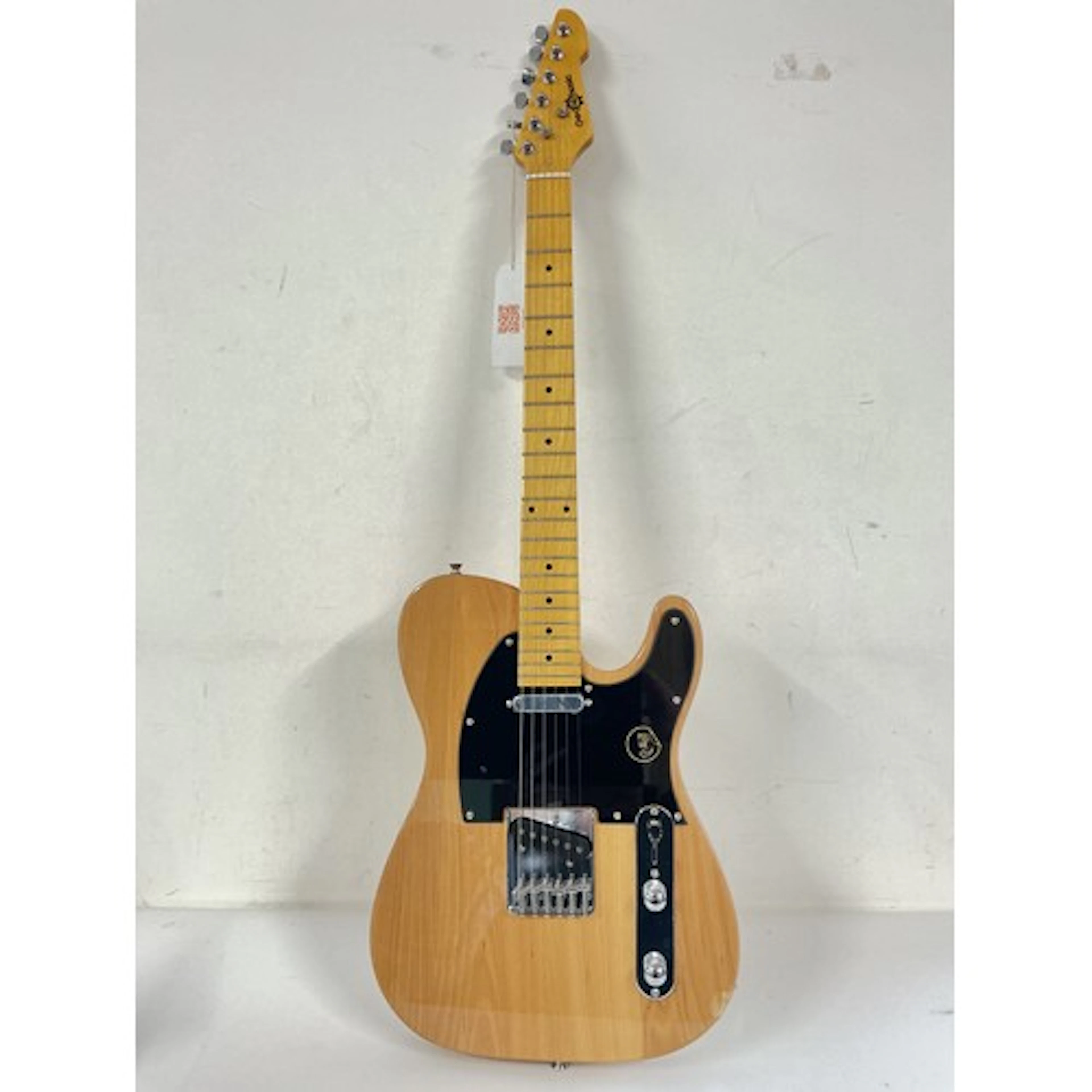 A Gear 4 Music tele style electric guitar. Comes with a soft...
