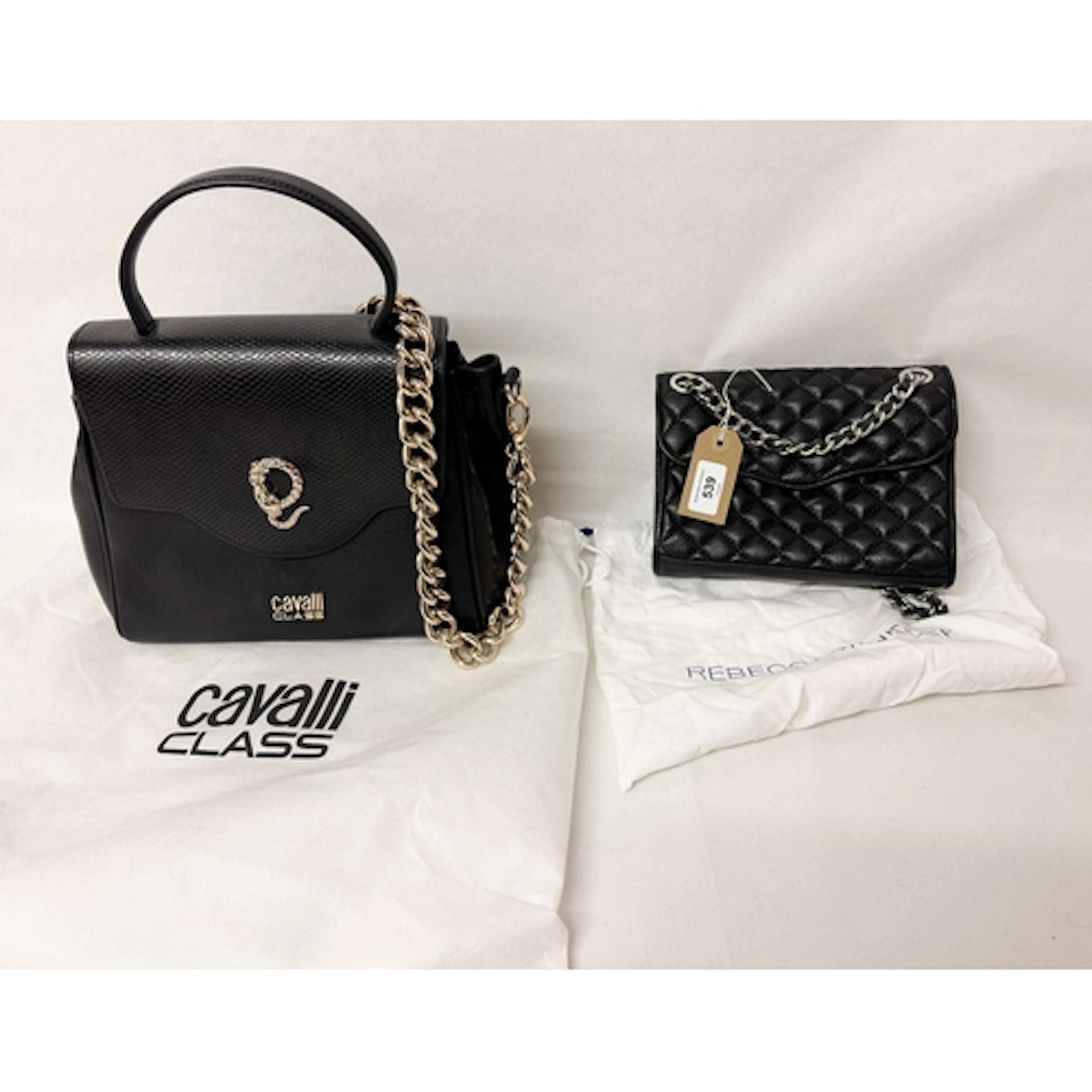 A Cavalli Class black leather handbag with storage bag and a...