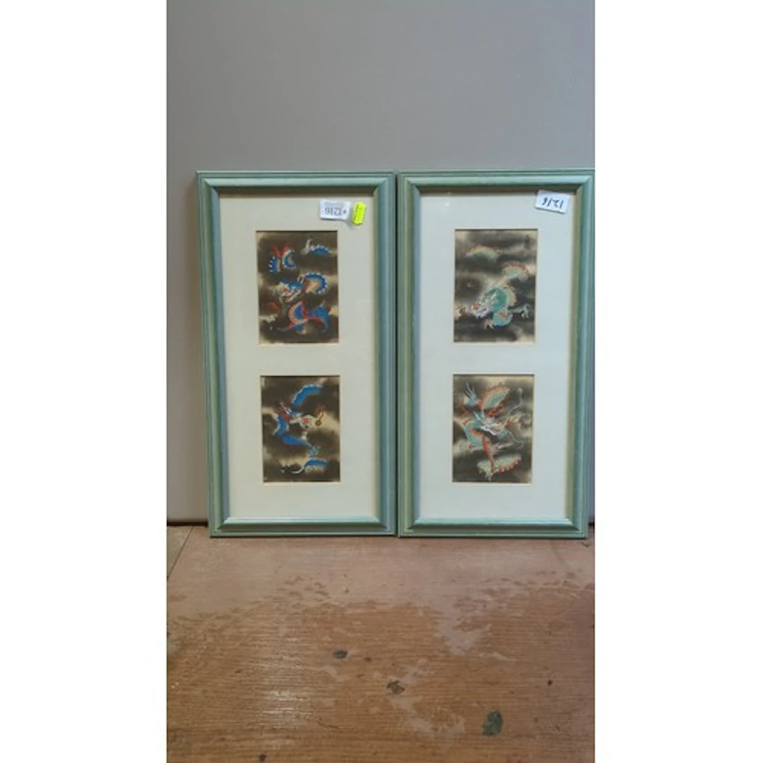 A pair of framed Chinese-style dragon prints, each mounted w...