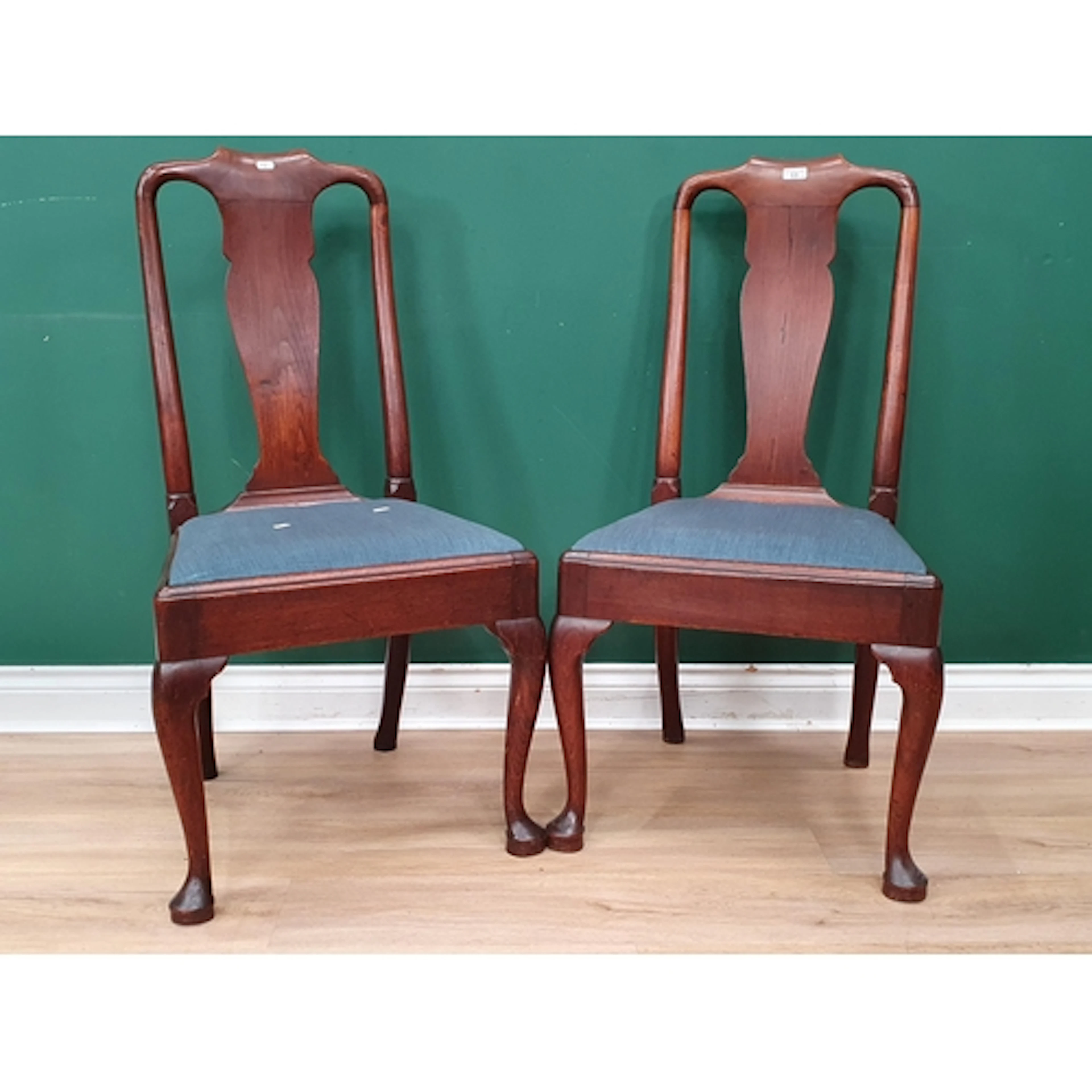 A pair of early 18th century walnut Side Chairs with shaped ...