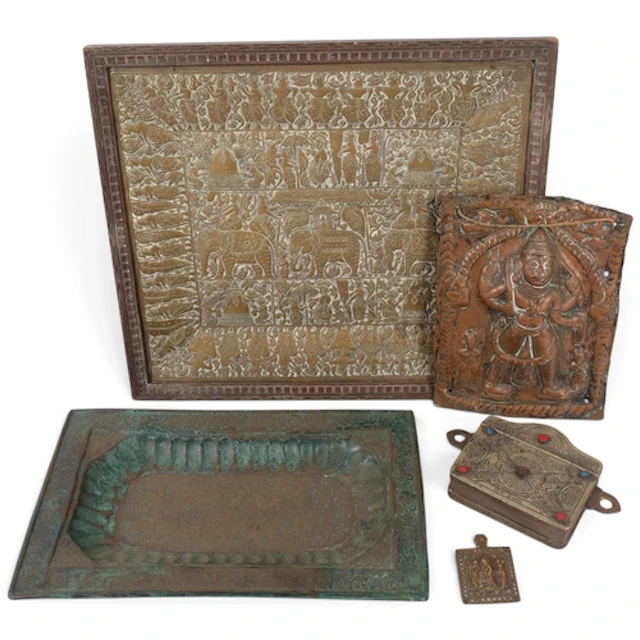 A group of Indian copper and brass plaques, and a small Midd...