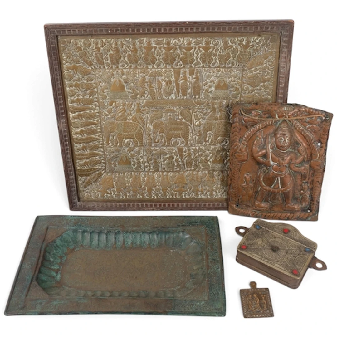 A group of Indian copper and brass plaques, and a small Midd...