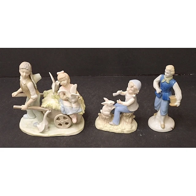 3 Porcelain Figurines, boy holding a top hat indistinctly ma...