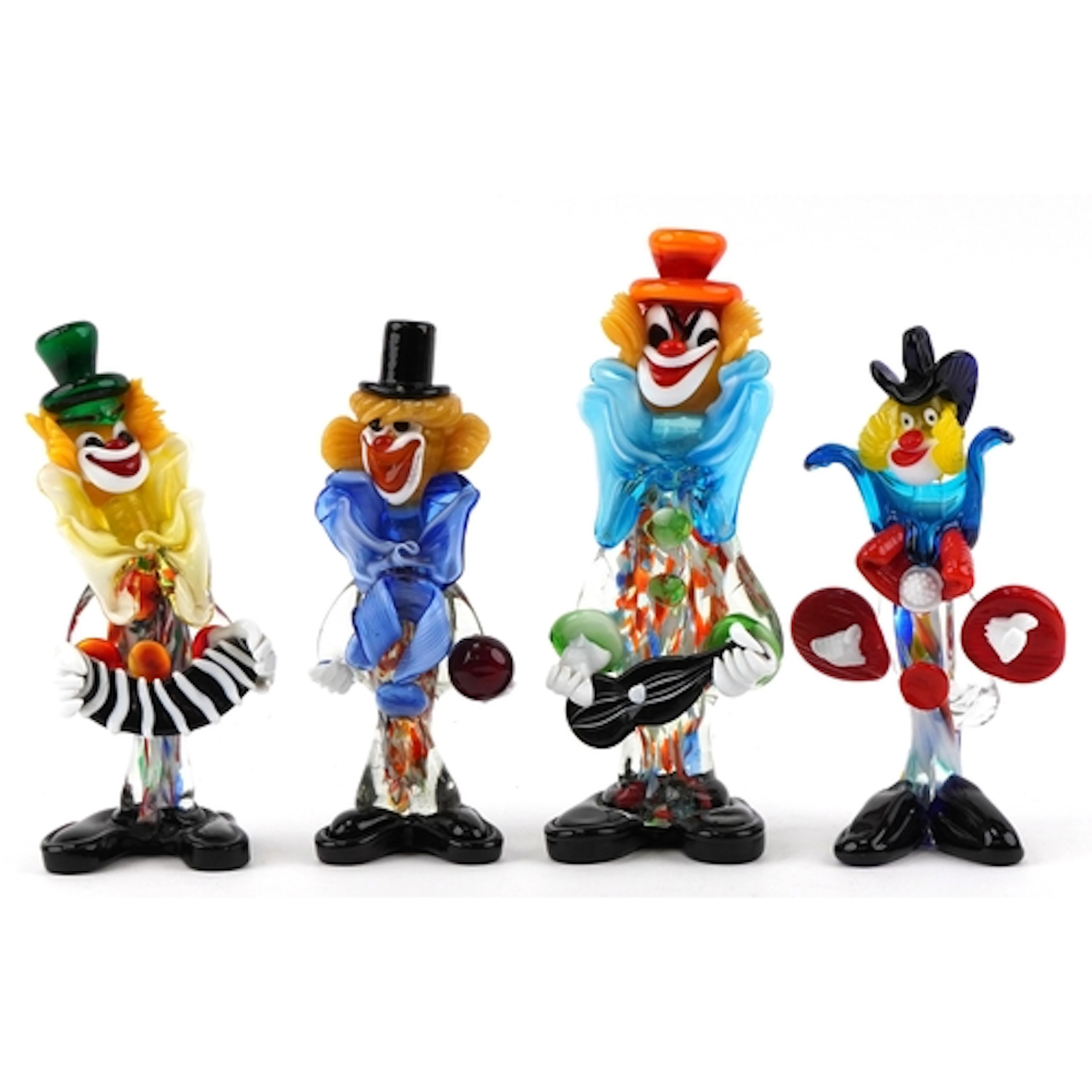 Four Murano and Murano style colourful glass clowns, the lar...