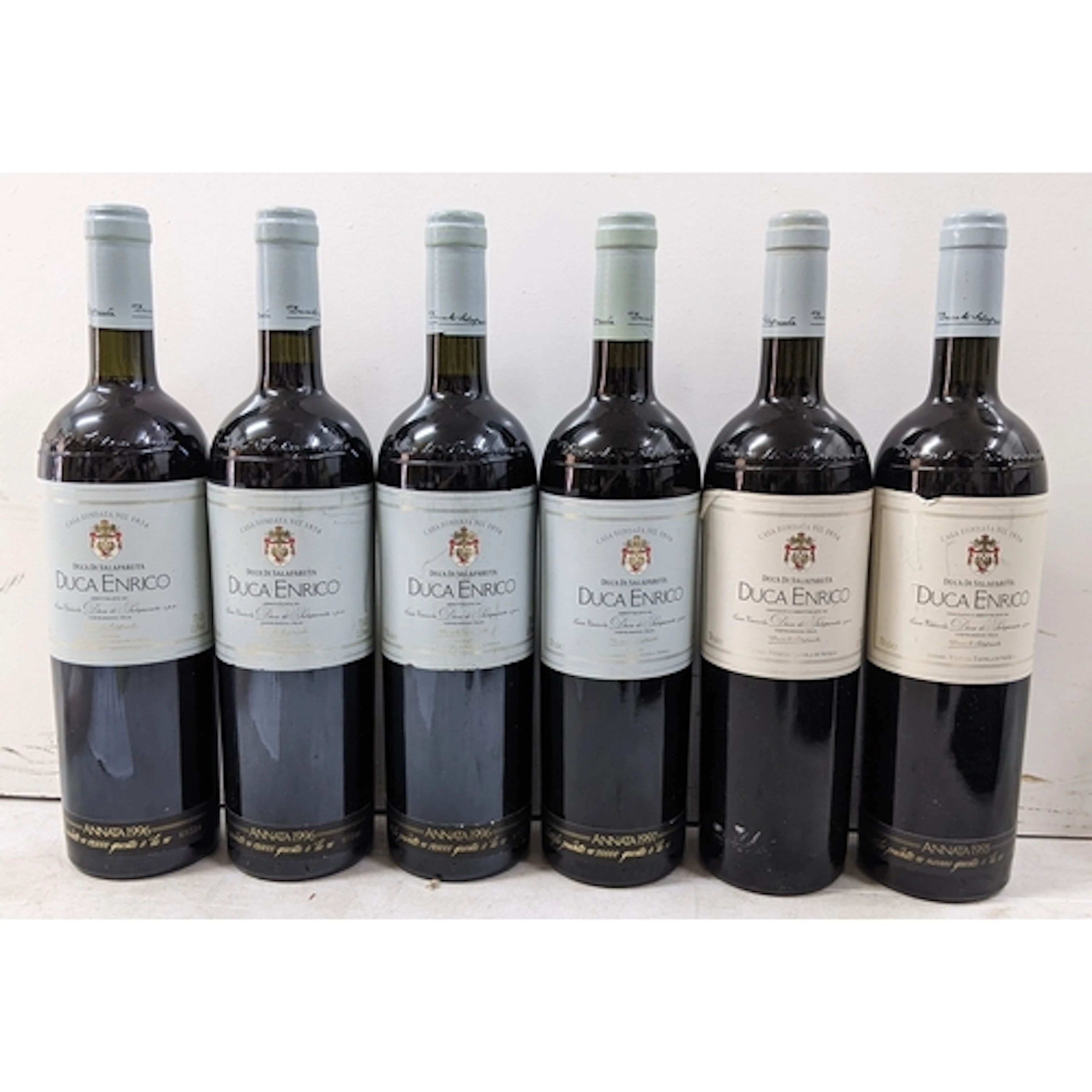 A group of six bottles of Duca Enrico, Duca di Salaparuta, c...