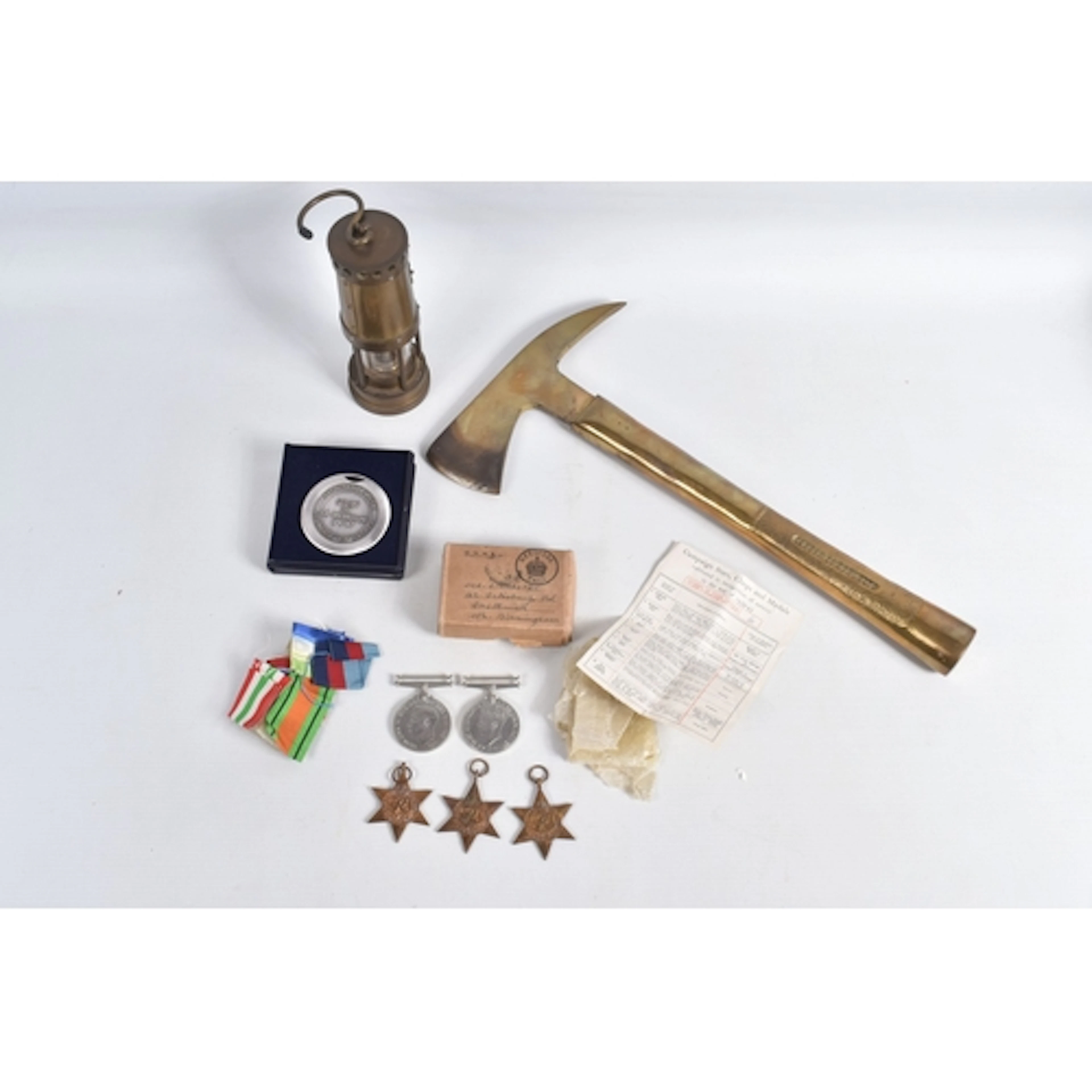 A BOXED SET OF WWII ROYAL NAVY MEDALS, A BRASS HAMMER AND A ...