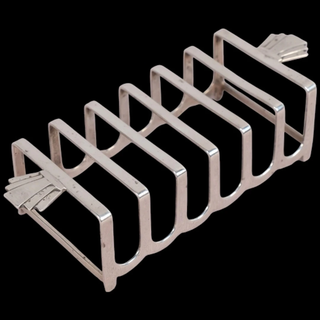 An Art Deco George VI silver 7-bar toast rack, Barker Brothe...