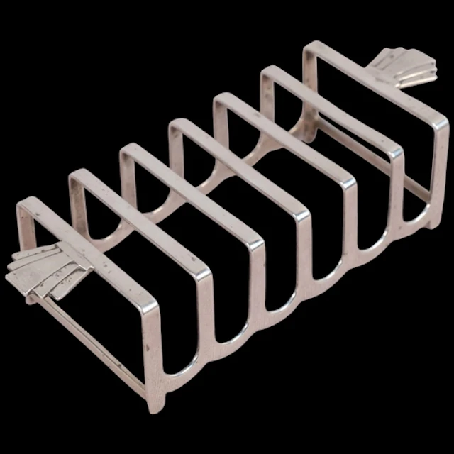 An Art Deco George VI silver 7-bar toast rack, Barker Brothe...