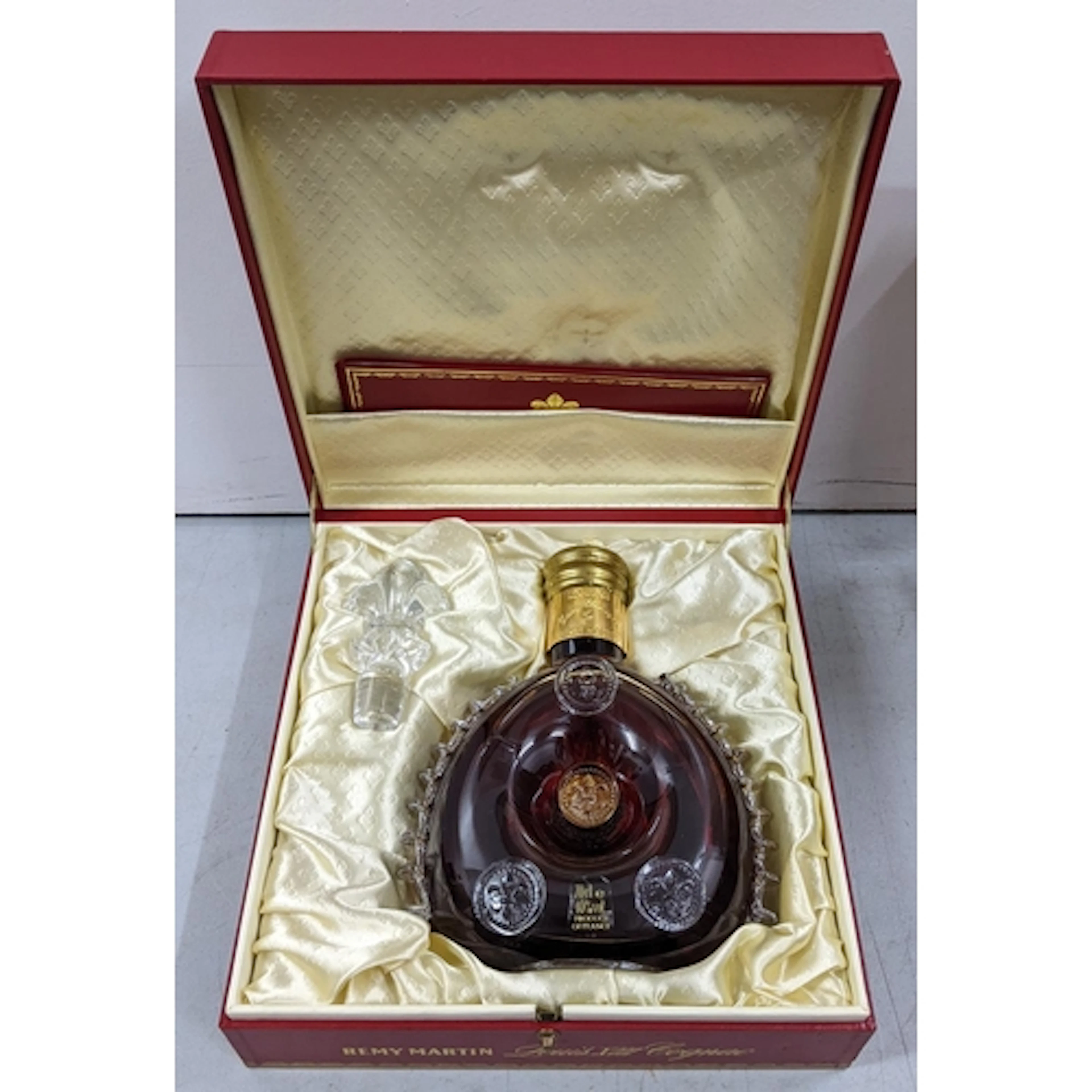 A bottle of Rémy Martin Louis XIII Grande Champagne Cognac, ...