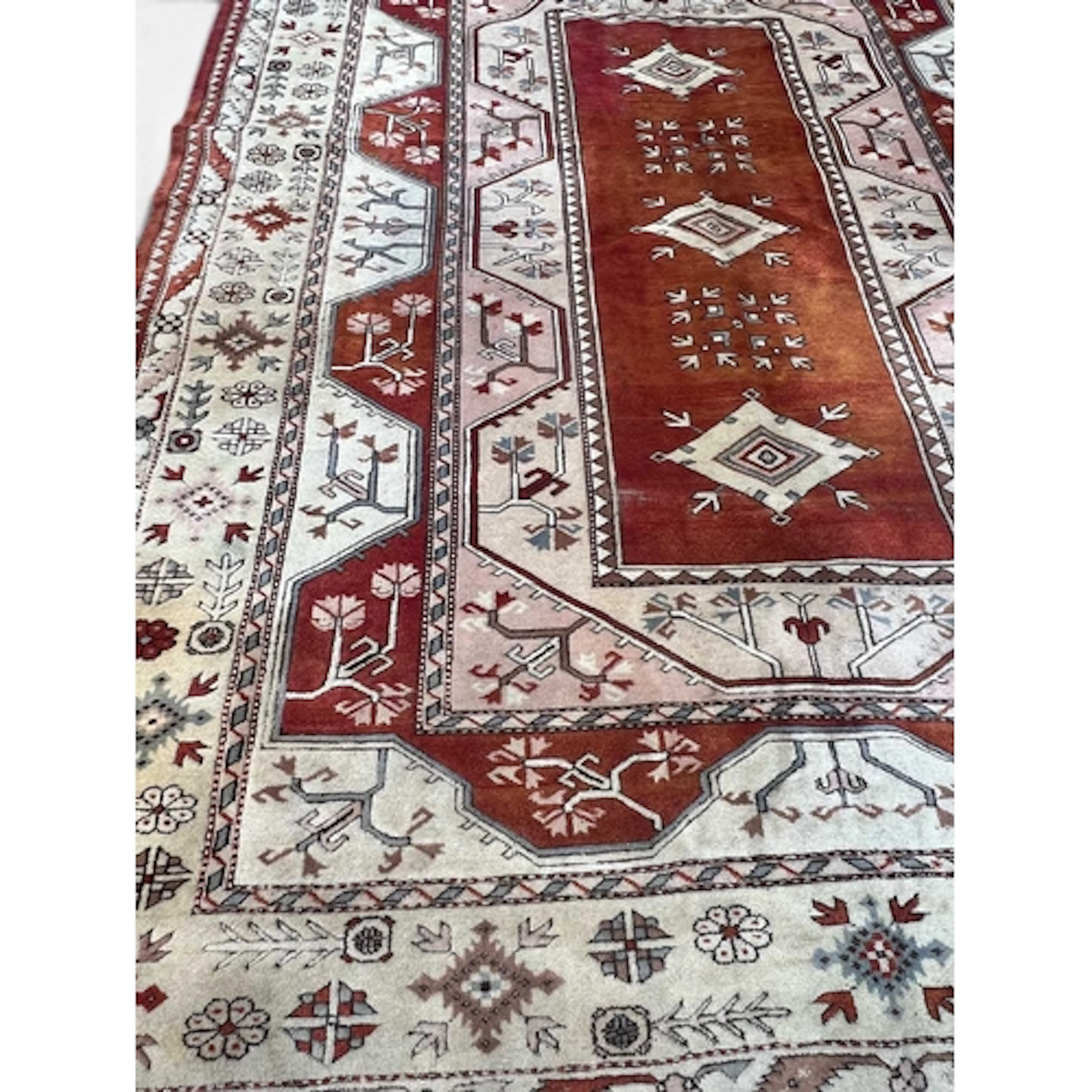 A LARGE TURKISH RUG 330 x 250cm