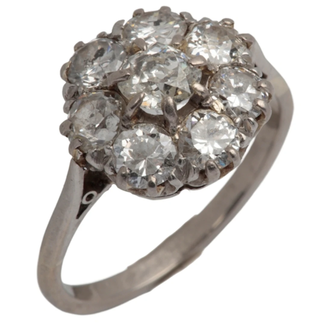 A diamond cluster ring, early 20th century, set with circula...