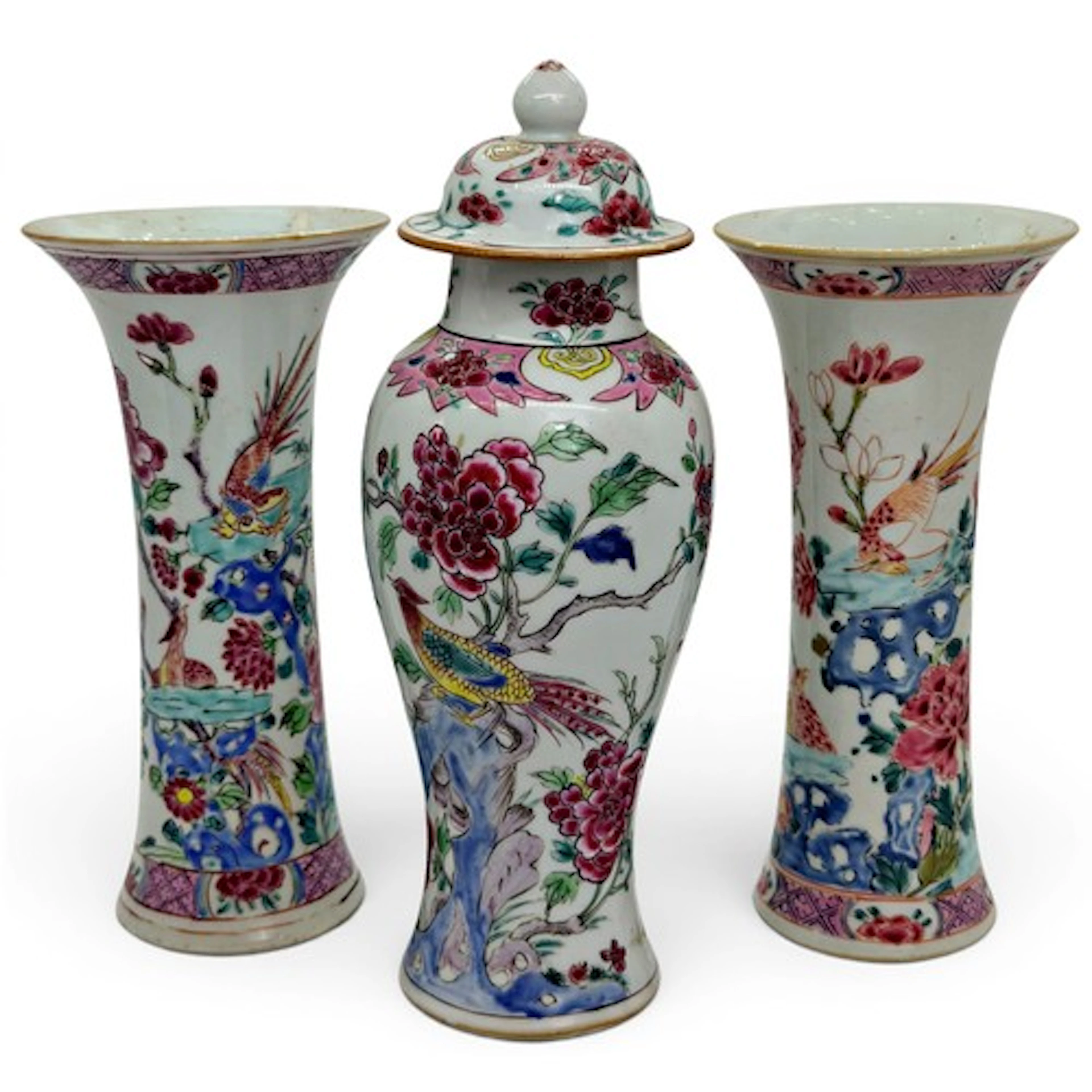 A Chinese Famille Rose three piece porcelain garniture, Qian...