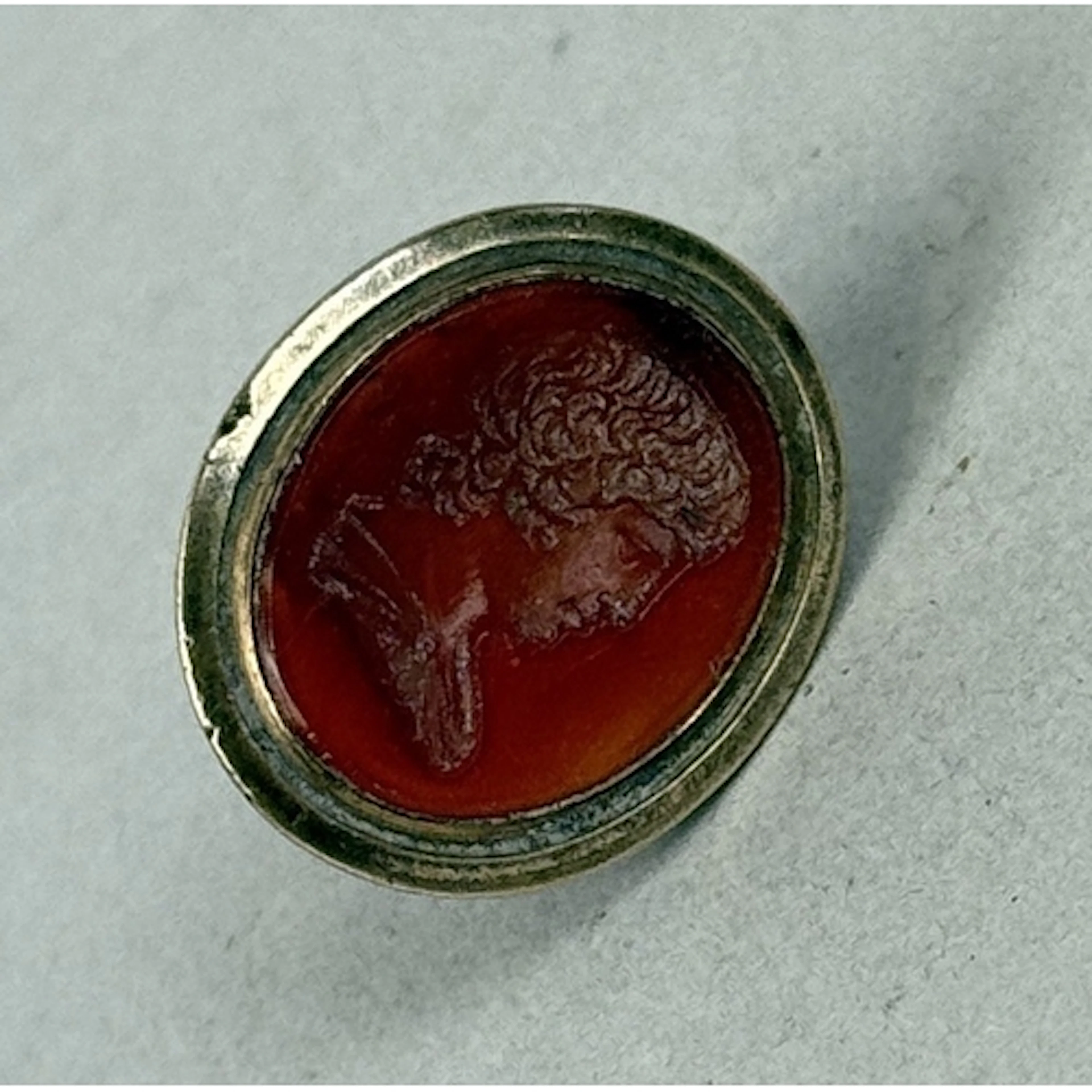 AN 18TH CENTURY CARNELIAN INTAGLIO SEAL, POSSIBLY OF NARCISS...