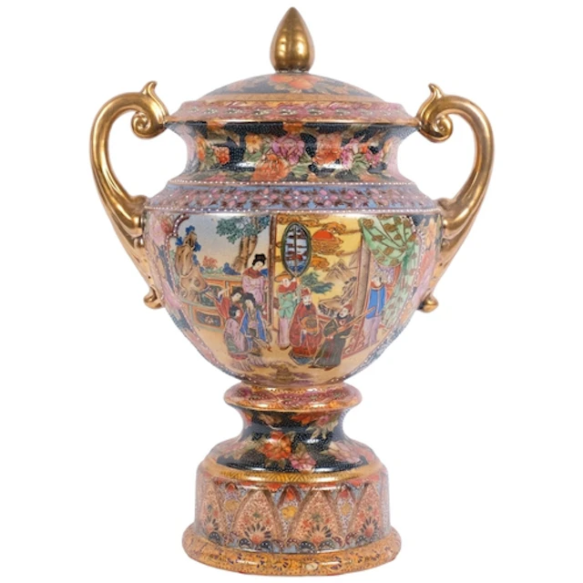 An ornate Oriental reproduction 2-handled urn and cover, wit...