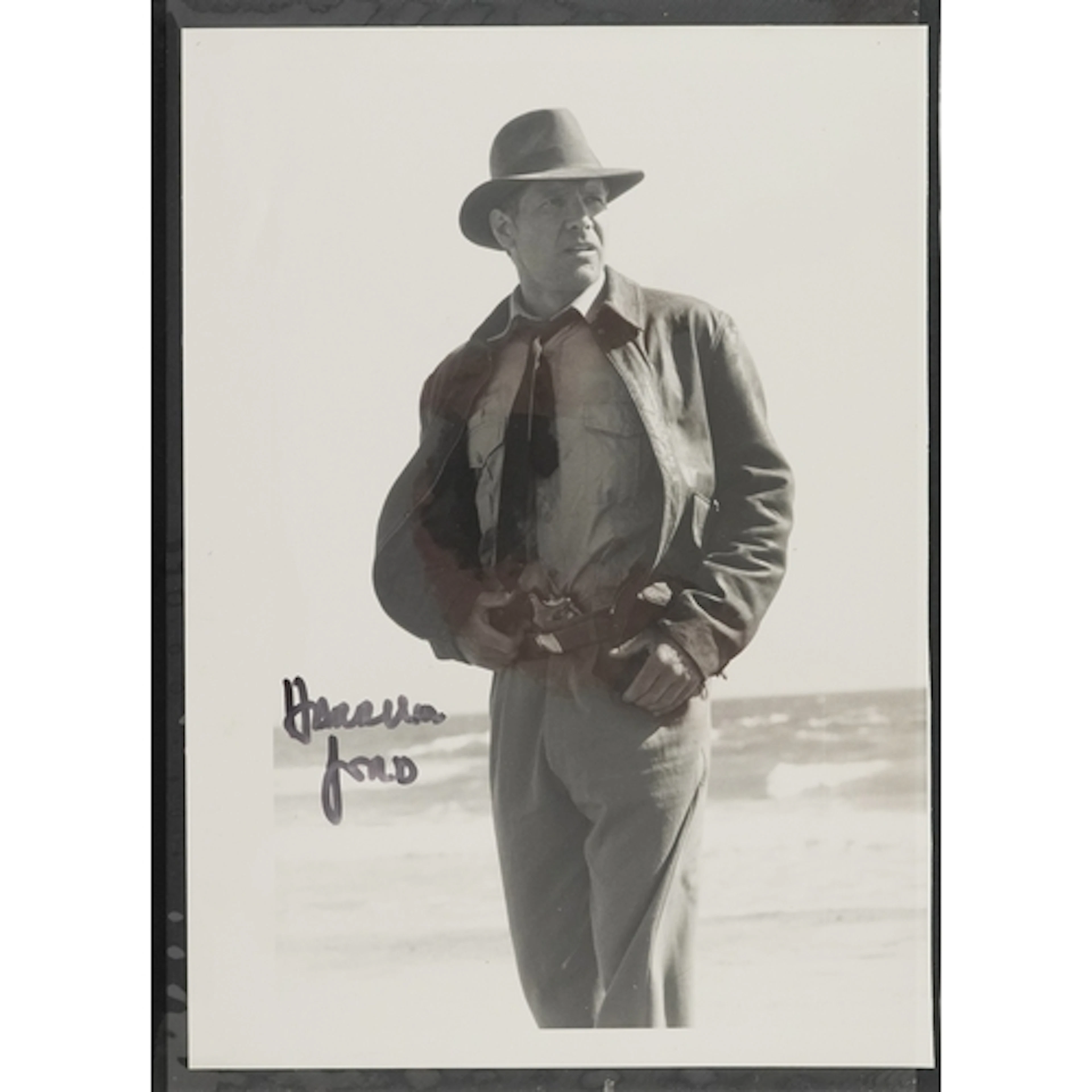 Signed promotional photograph of Harrison Ford as Indiana Jo...