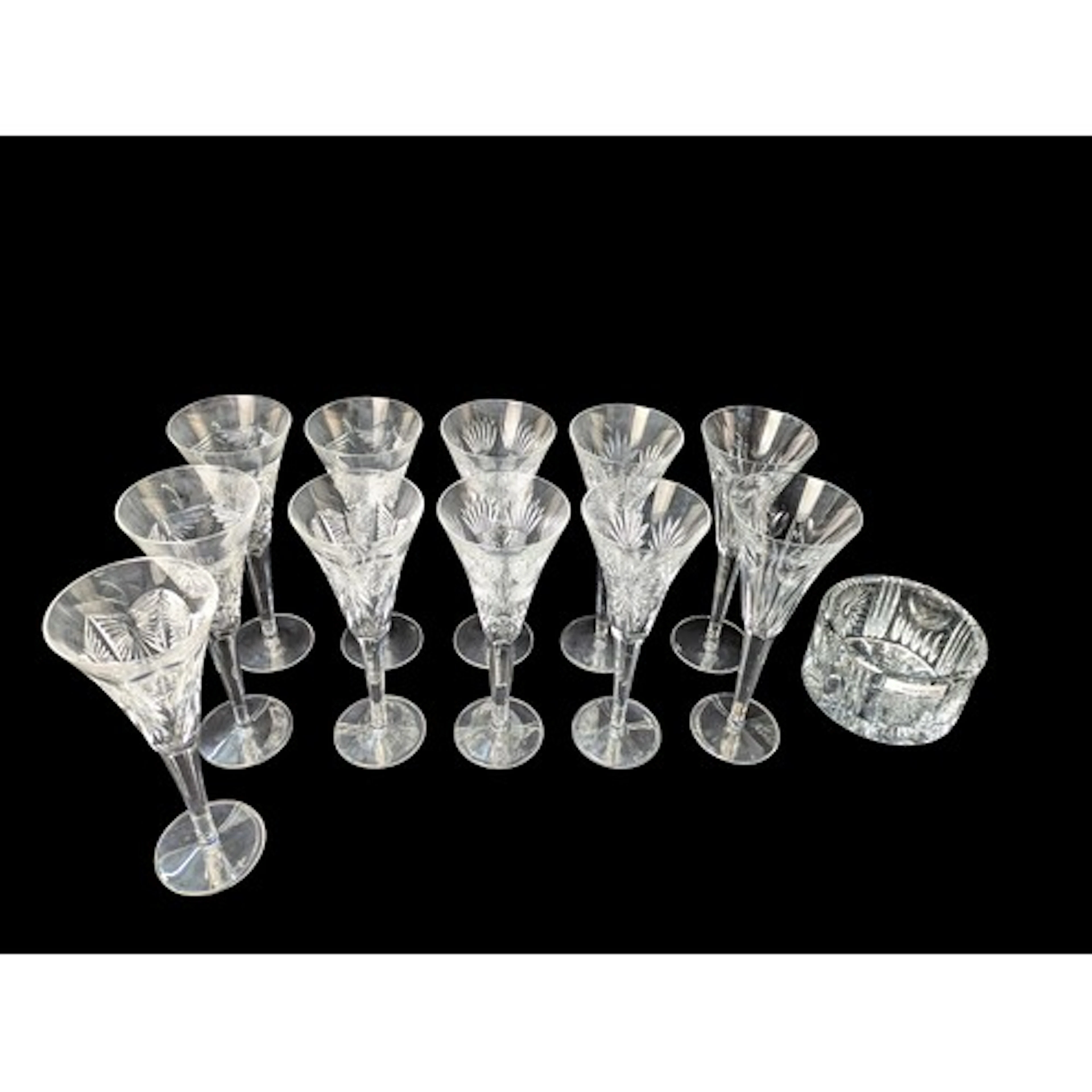 A group of Waterford Crystal cut-glass stemmed glasses with ...