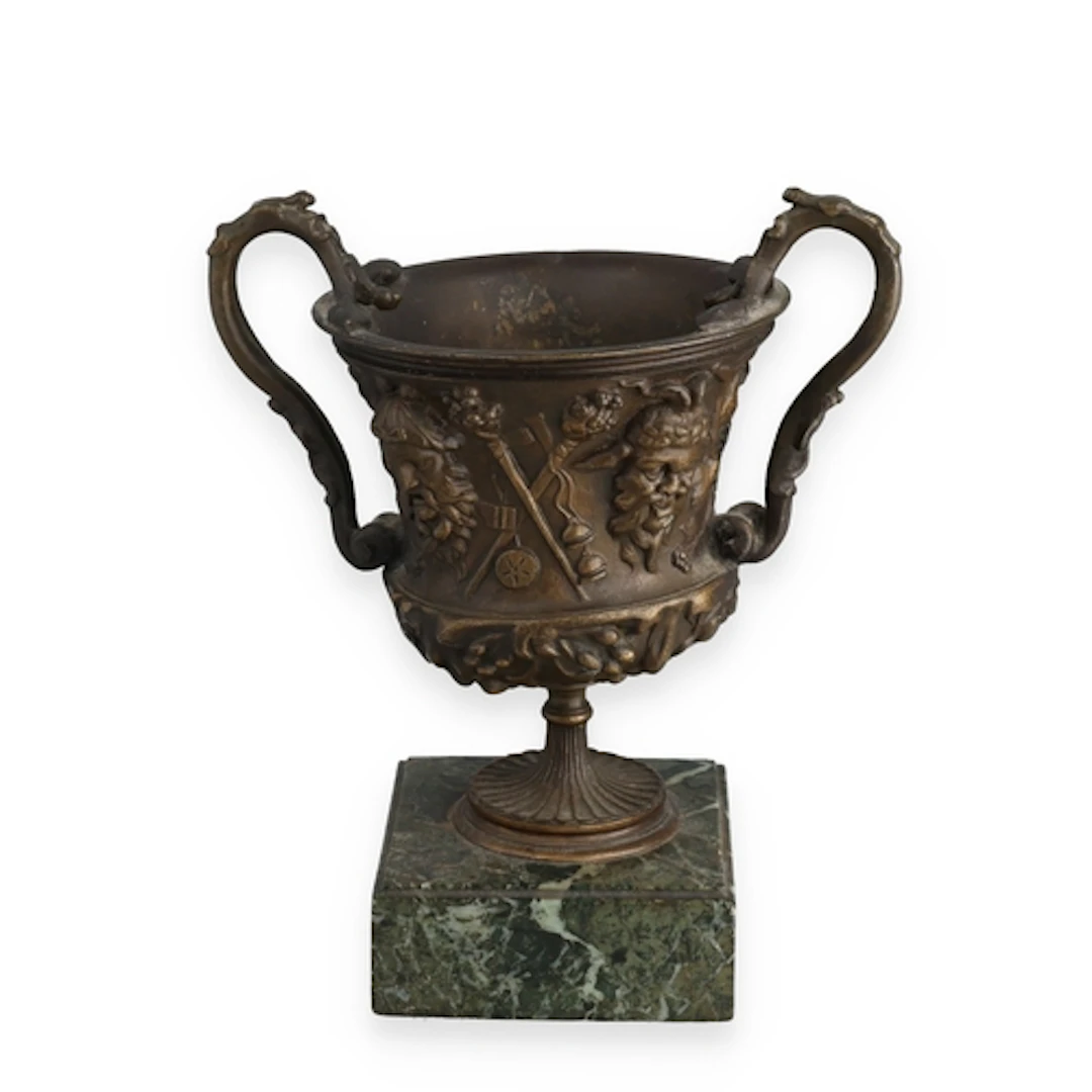 A BRONZE TWO-HANDLED CLASSICAL VASE, AFTER THE ANTIQUE On a ...