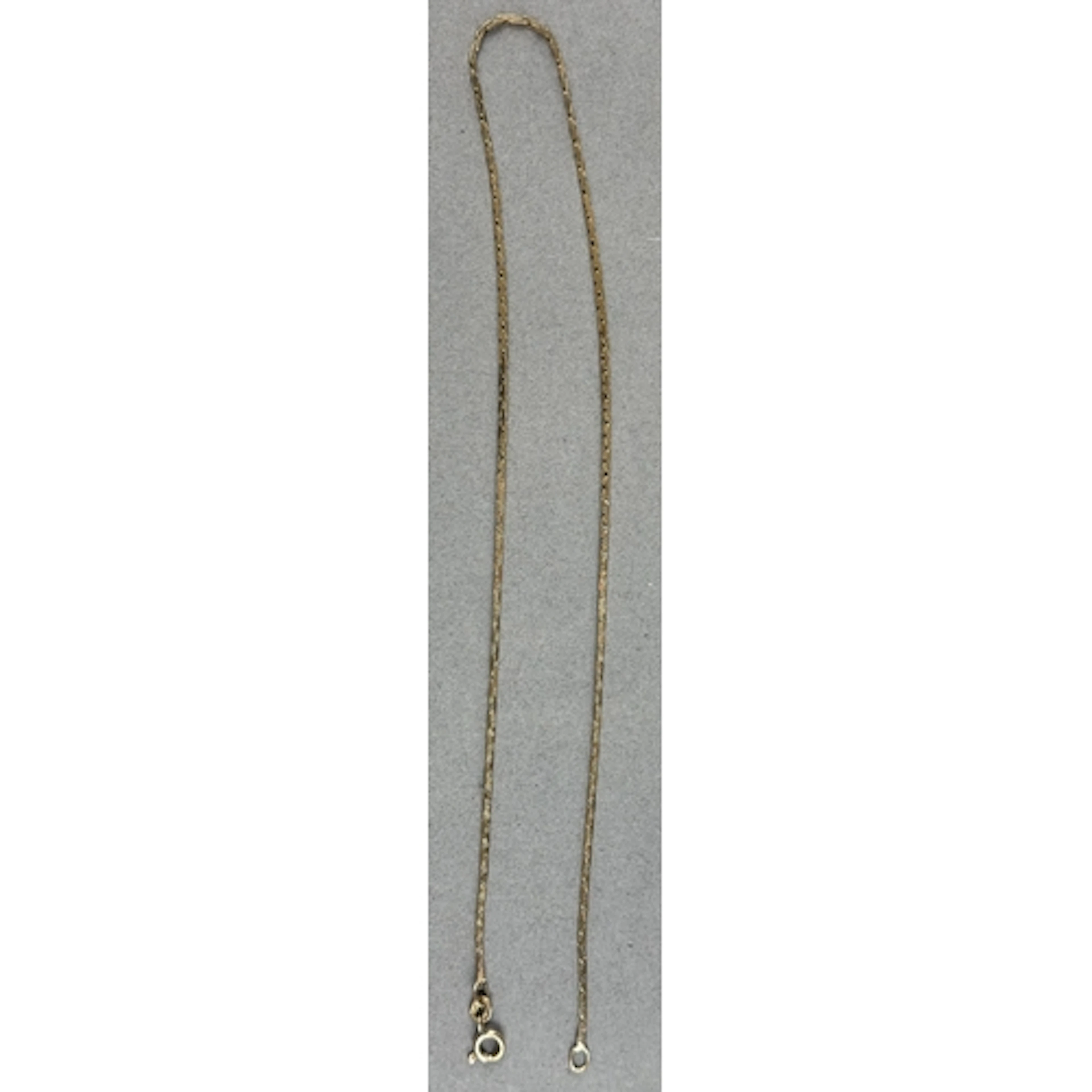 Jewellery: a yellow metal zip style necklace, marked 9k and ...
