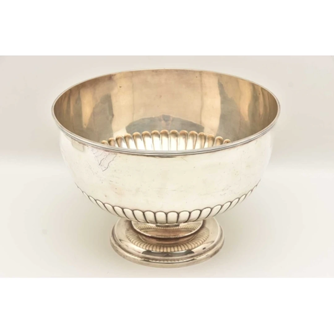 A EDWARD VII SILVER PUNCH BOWL, a large bowl raised on a cir...