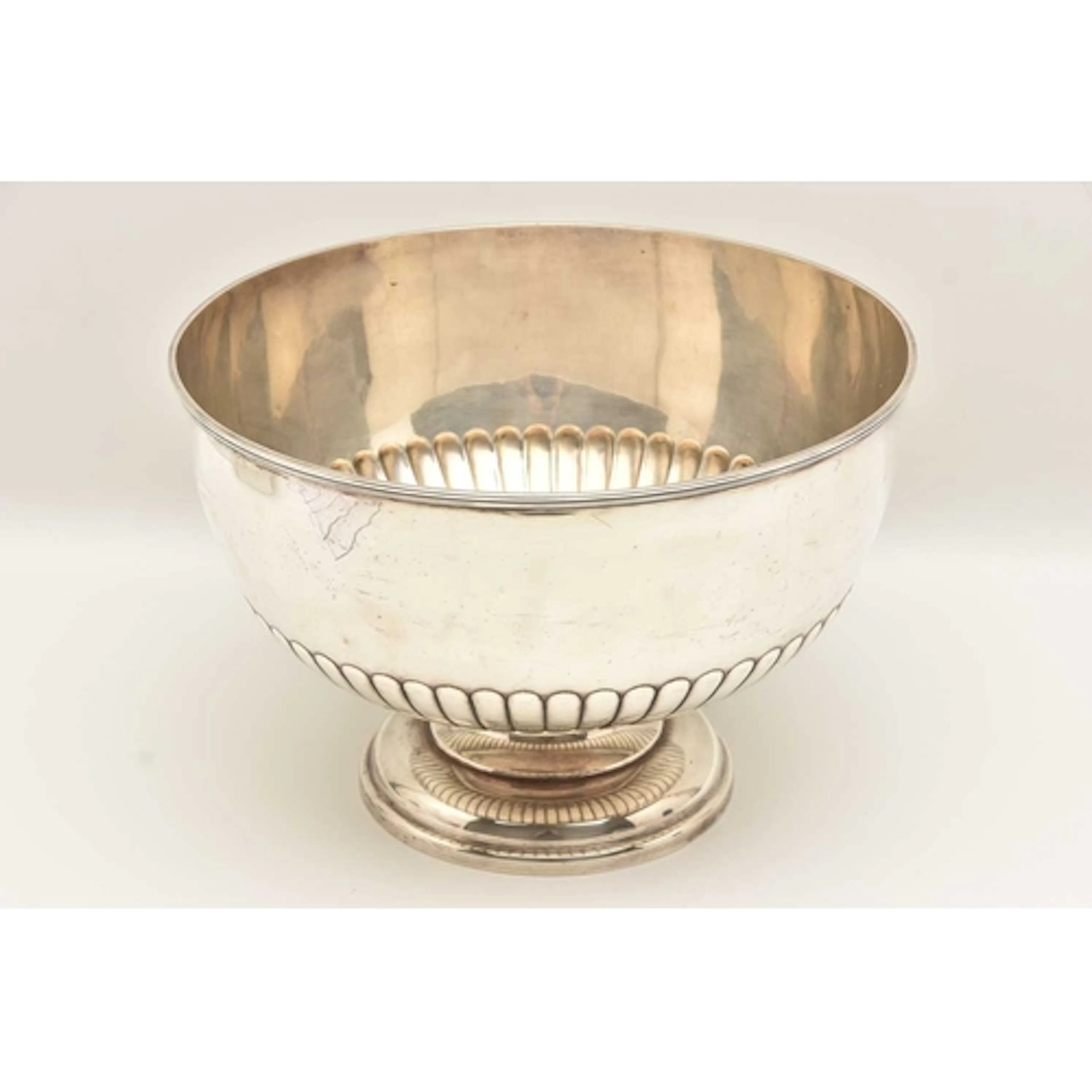 A EDWARD VII SILVER PUNCH BOWL, a large bowl raised on a cir...