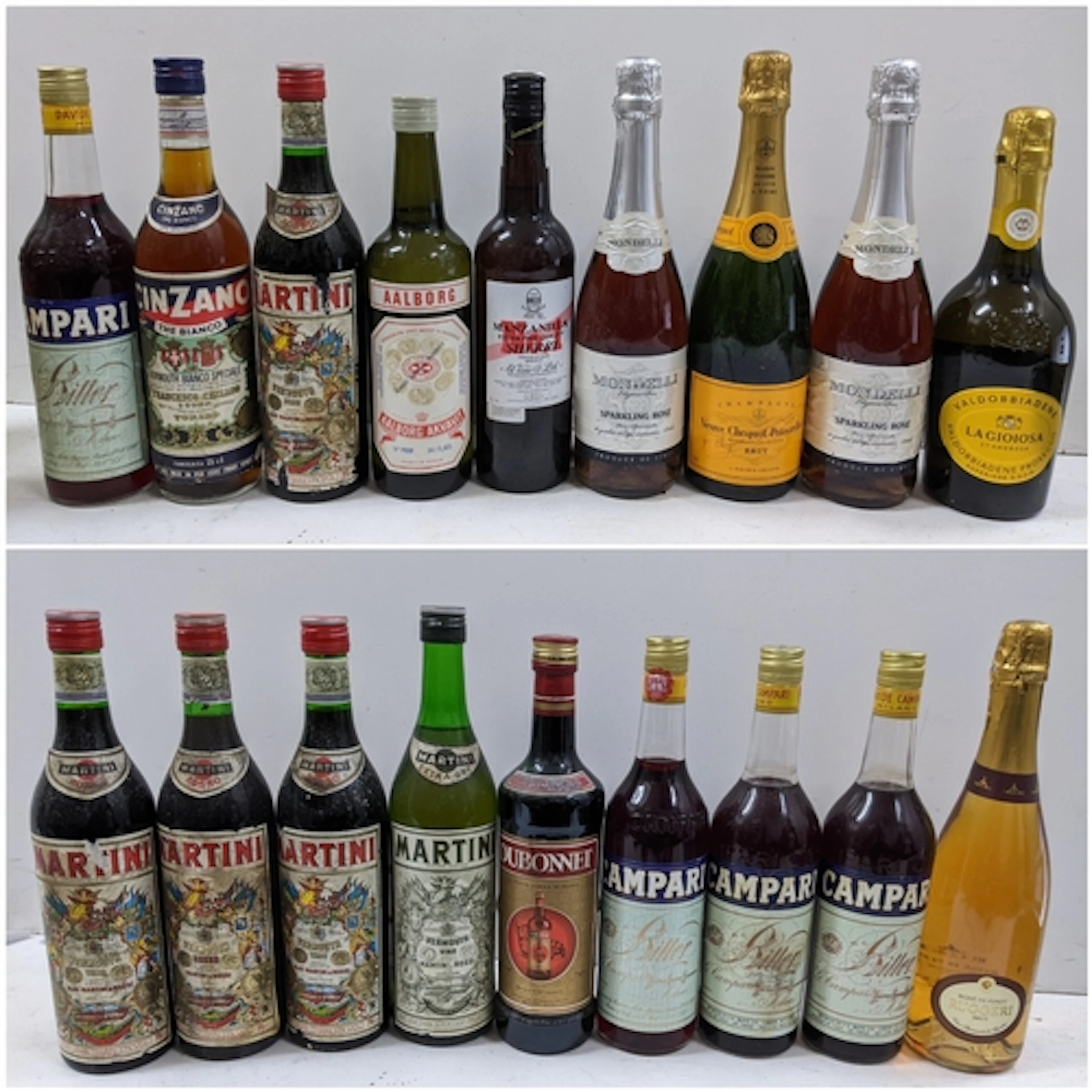 A mixed group of eighteen bottles of spirits, vermouth, and ...