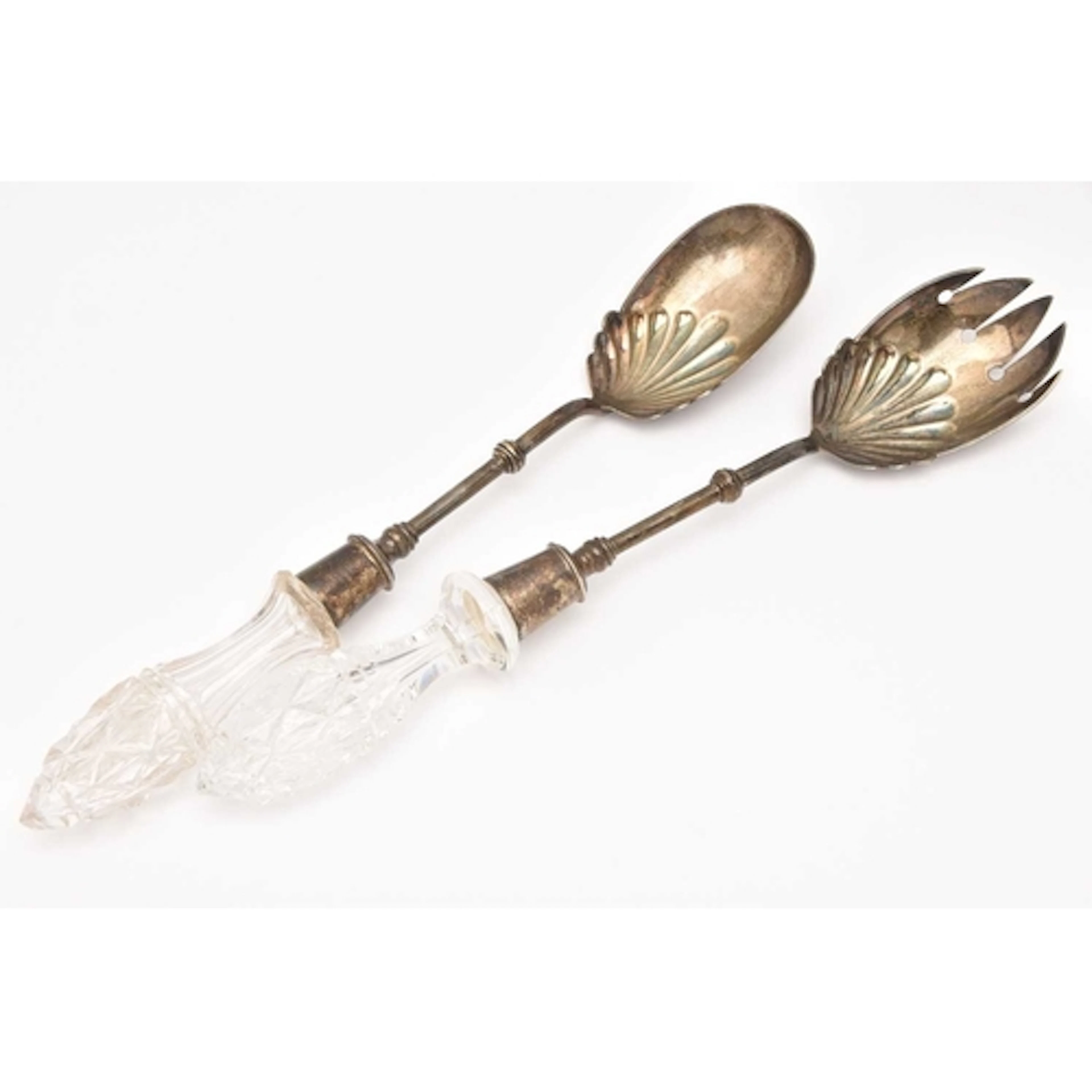 A PAIR OF SILVER SALAD SERVERS, with shell shape bowls, fitt...