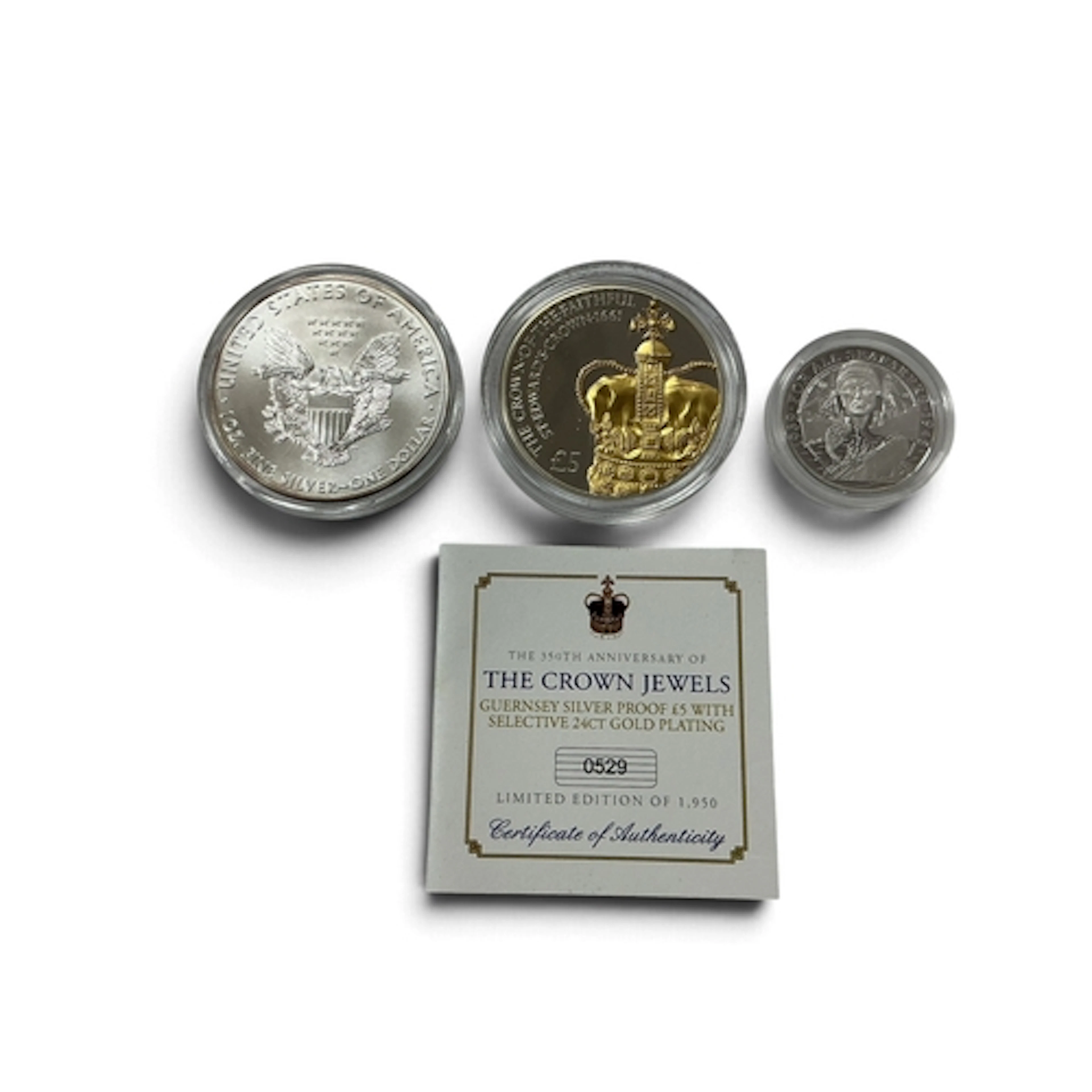 Three Silver Coins, includes a 2011 USA 1oz fine silver Doll...