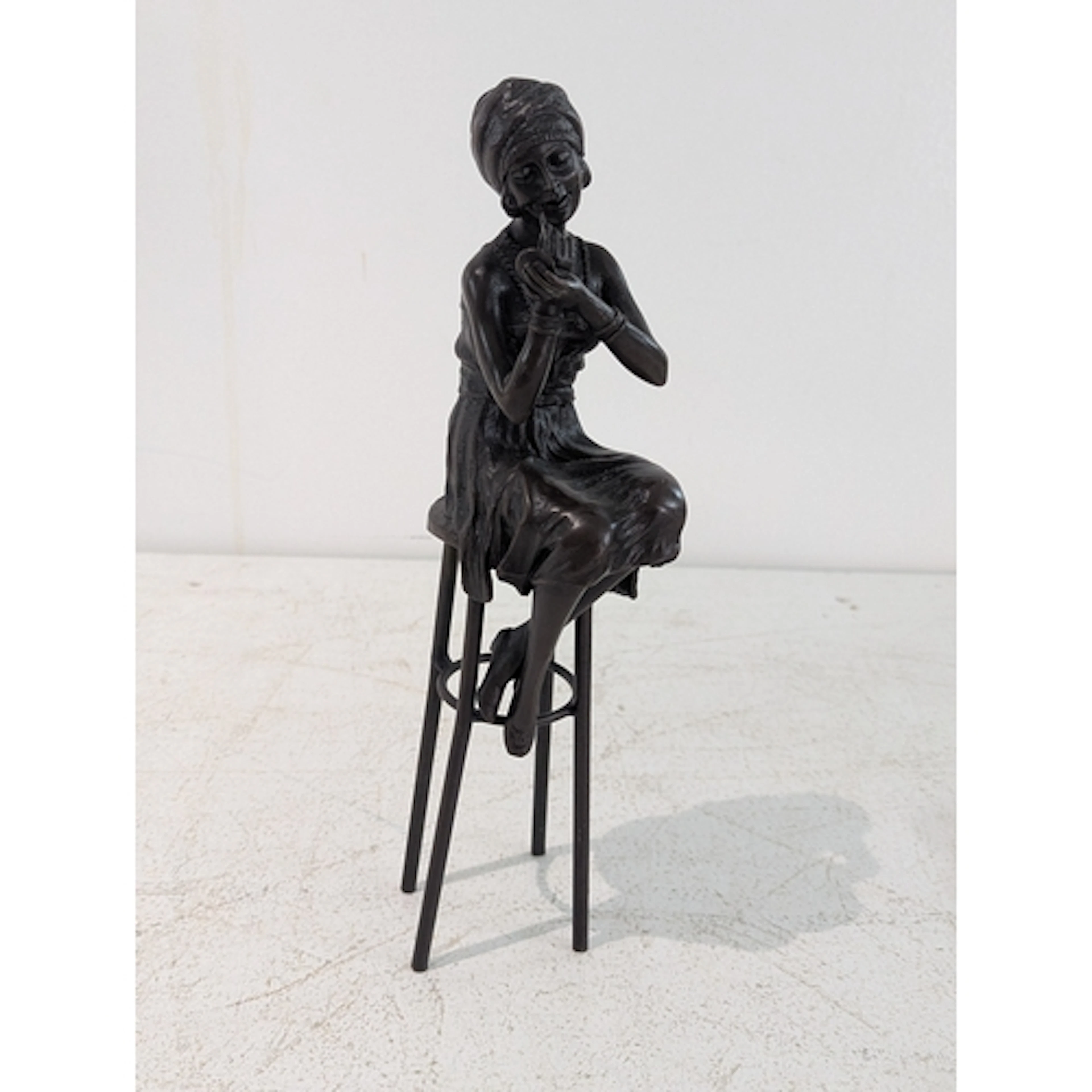 An Art Deco bronze Demetre H Chiparus sculpture, A Little Ro...