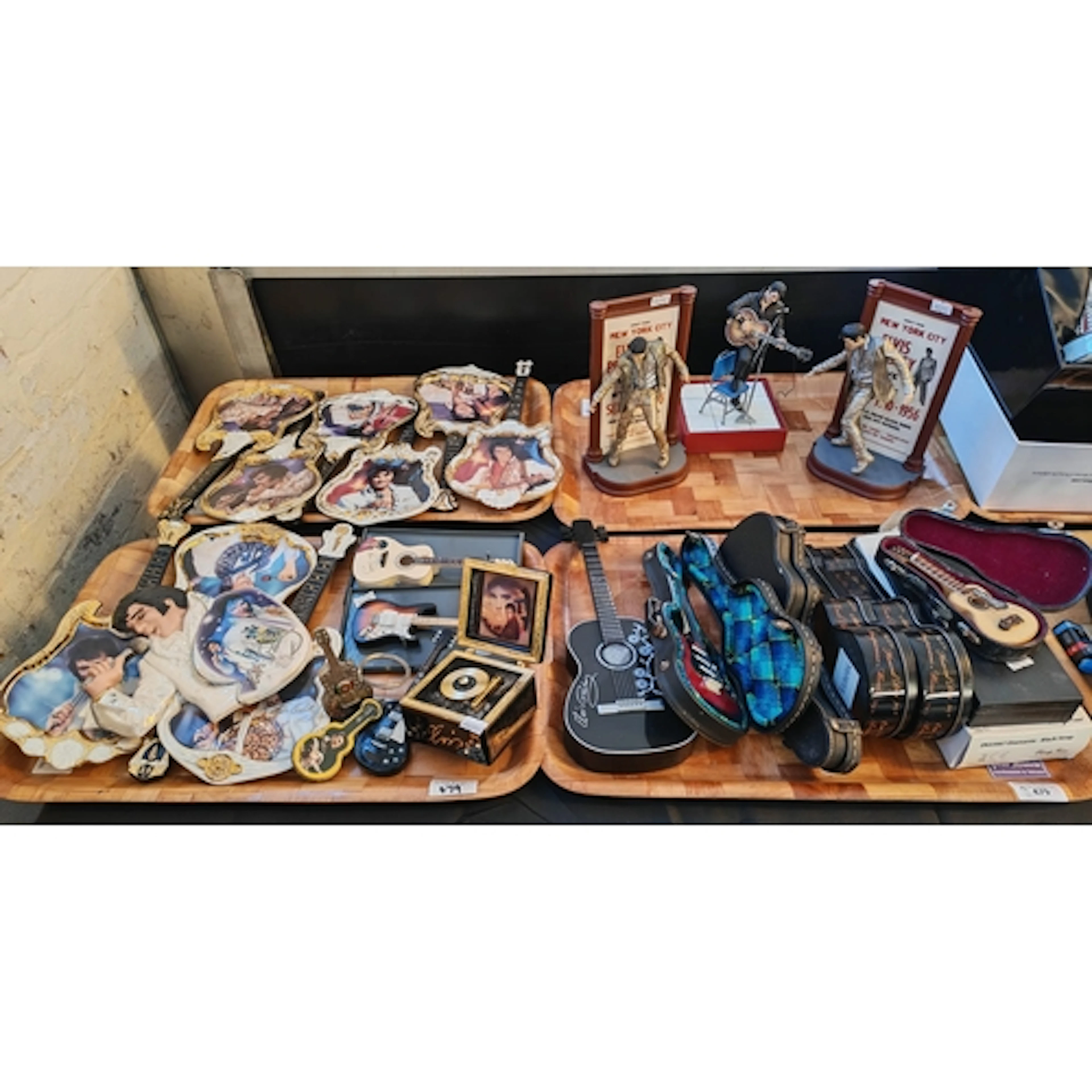 Four trays of Elvis Presley memorabilia to include: watch in...