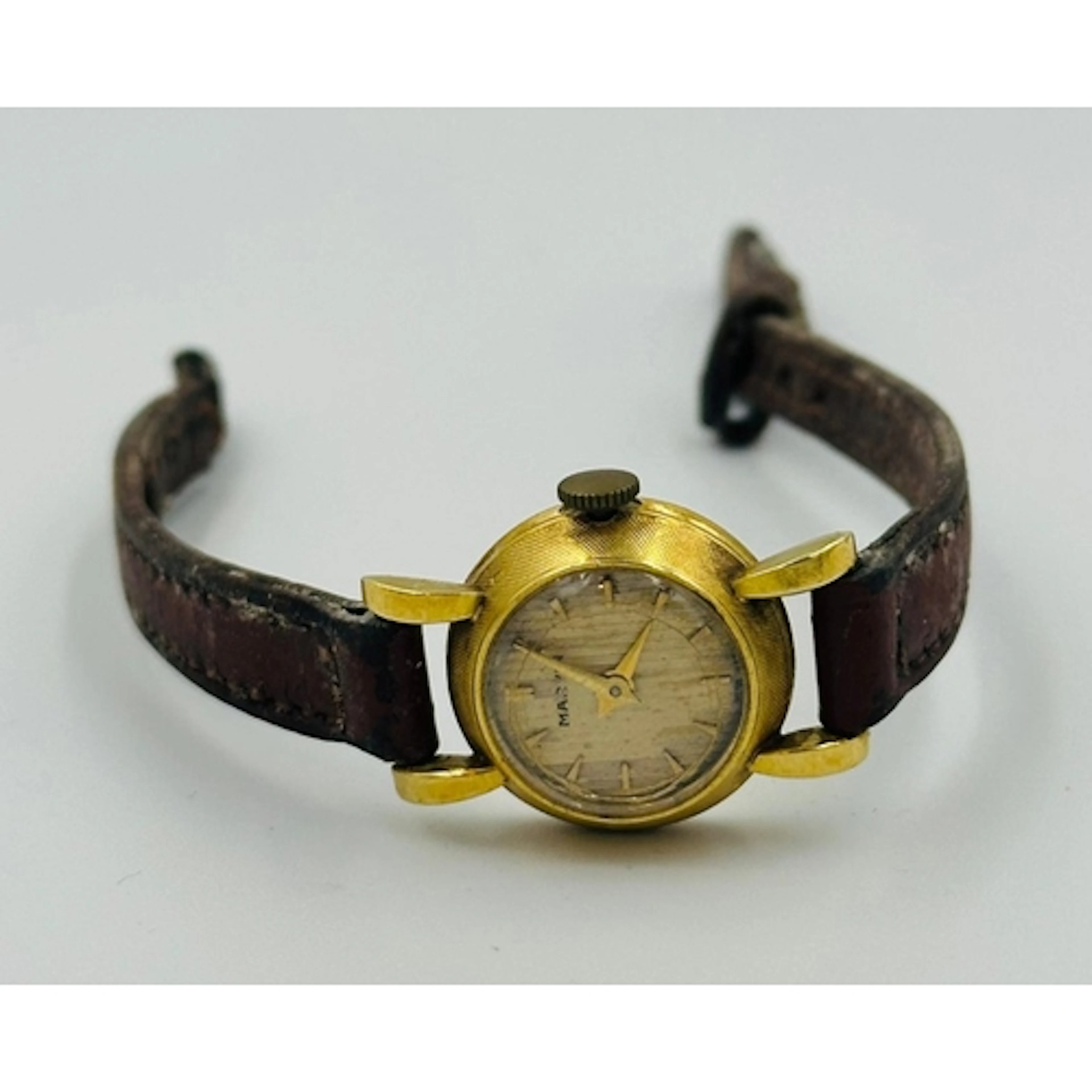 An 18ct gold Marvin Ladies watch on a leather strap.